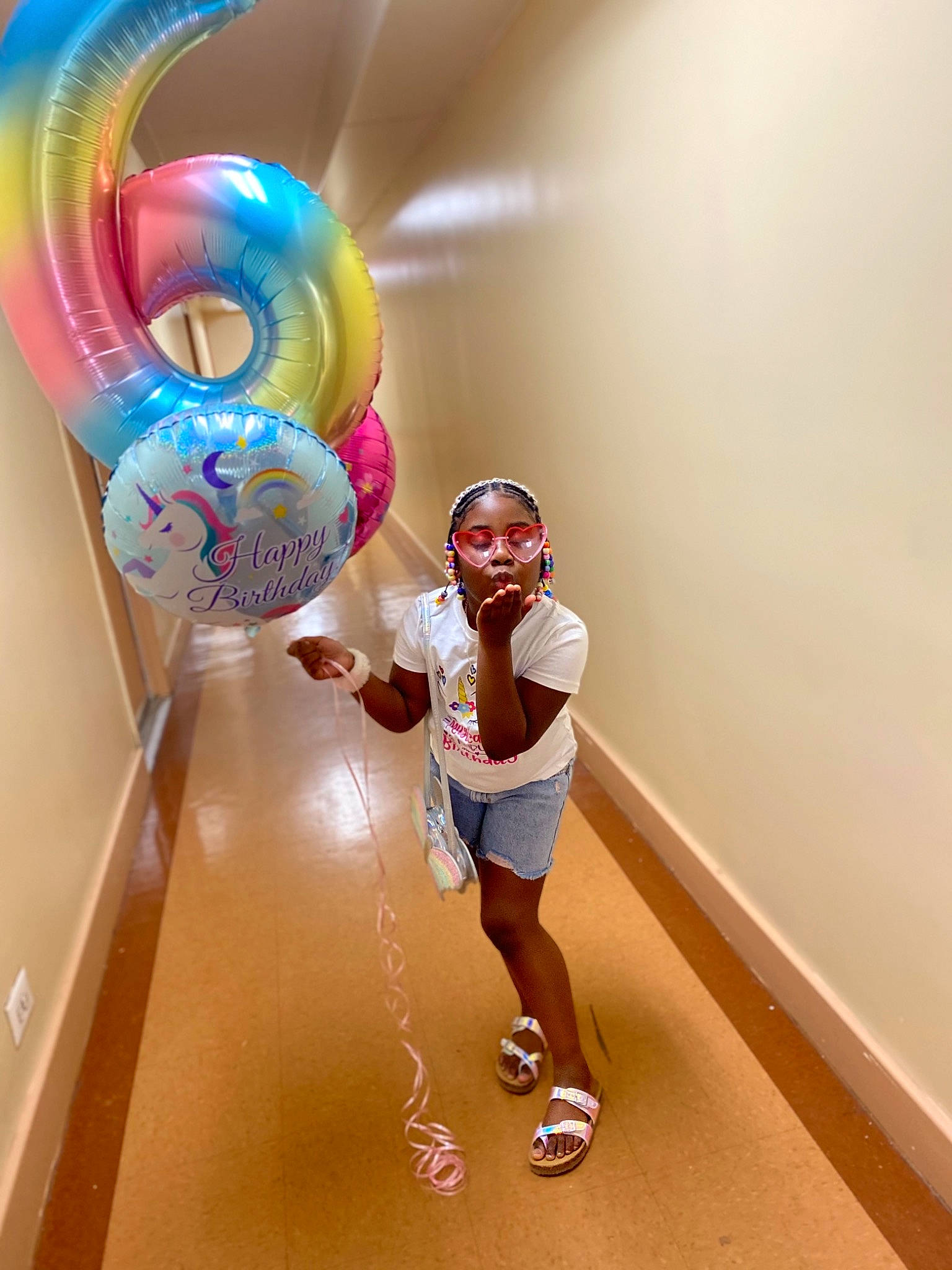 Siyah joined the competition — help win amazing prizes! balloon, ceiling, circle, flooring, fun, happy, headgear, human_leg, knee, leisure, magenta, party_supply, person, physical_fitness, recreation, room, shorts, smile, thigh, toddler