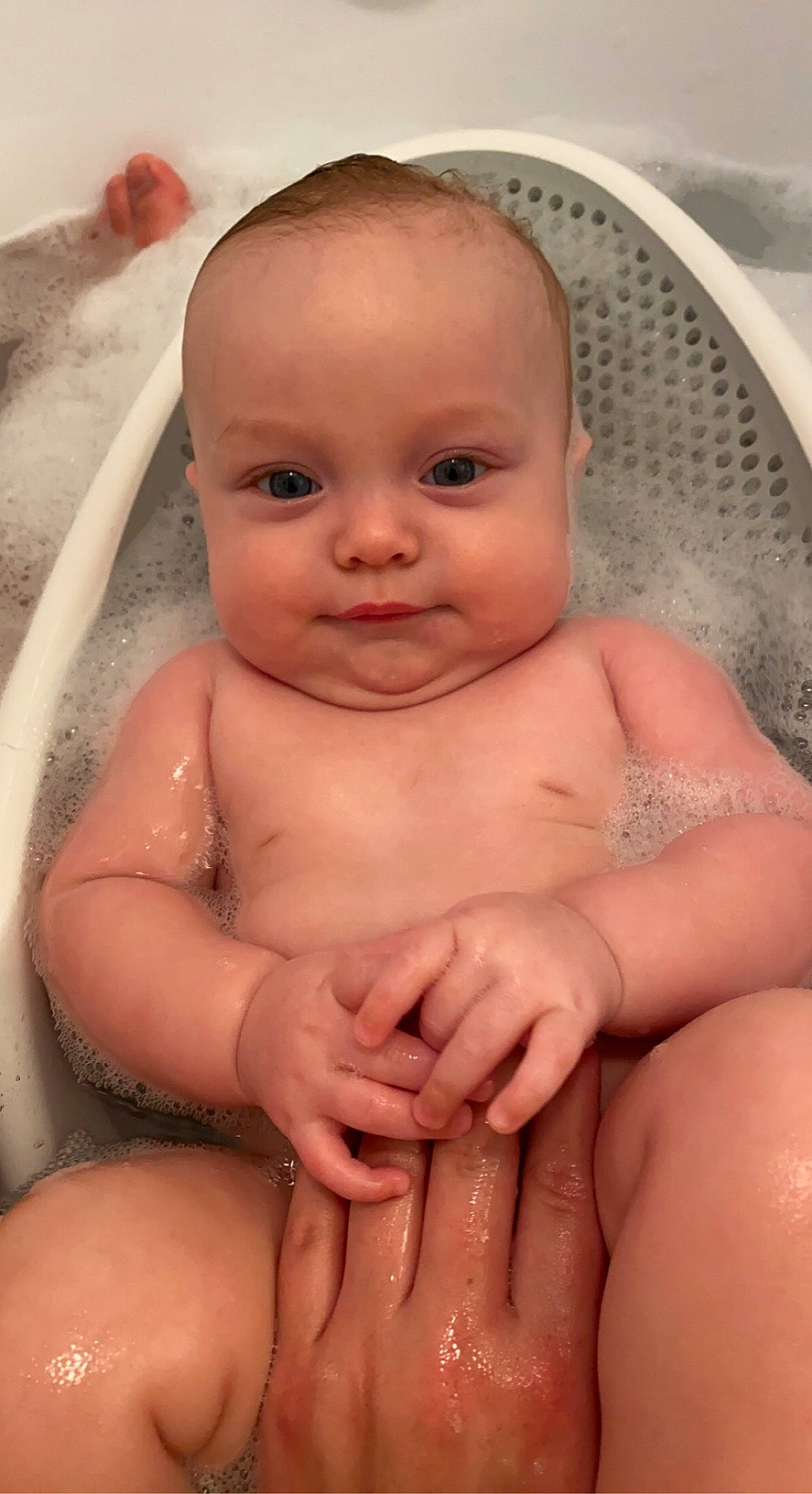 T.j is registered to the contest to win money with this photo: baby, cheek, eye, eyebrow, face, finger, forehead, gesture, hand, head, joint, leg, lip, mouth, muscle, nose, person, product, skin, smile