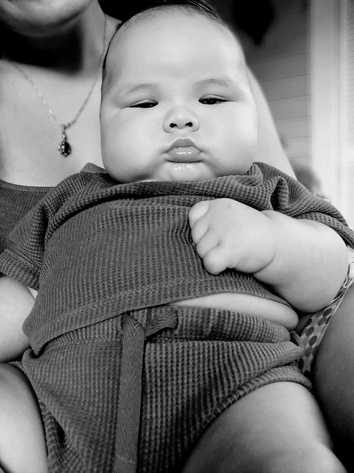 Jax Banner joined the competition — help win amazing prizes! adult, baby, black_and_white, cheeks, child, close_up, clothing, cute, expression, face, fist, hand, holding, indoor, infant, monochrome, person, portrait, skin, texture