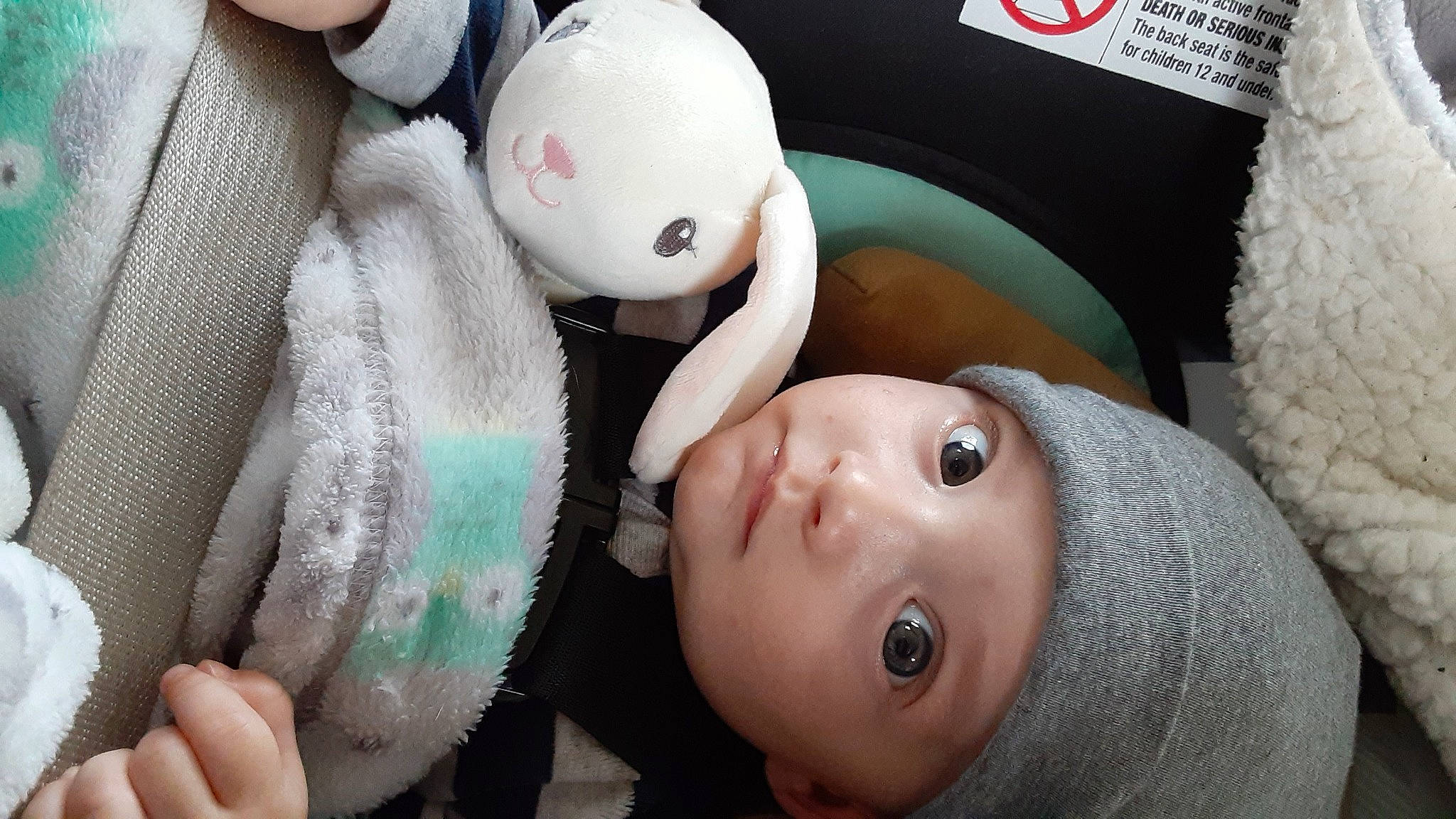 Gionni is registered to the contest to win money with this photo: baby, child, ear, eye, hand, headwear, mouth, person, skin, smile, toddler