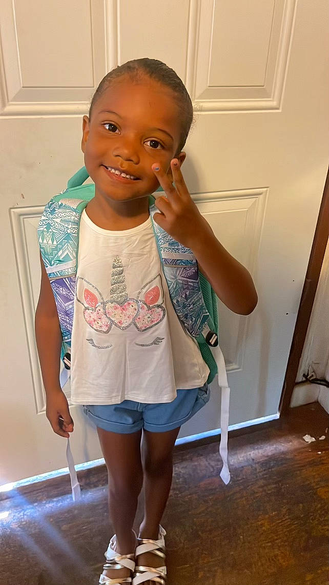 Hazel joined the competition — help win amazing prizes! arm, baby_toddler_clothing, cheek, eye, face, flooring, hair, happy, head, human_body, joint, joy, knee, neck, person, shoulder, skin, sleeve, smile, standing