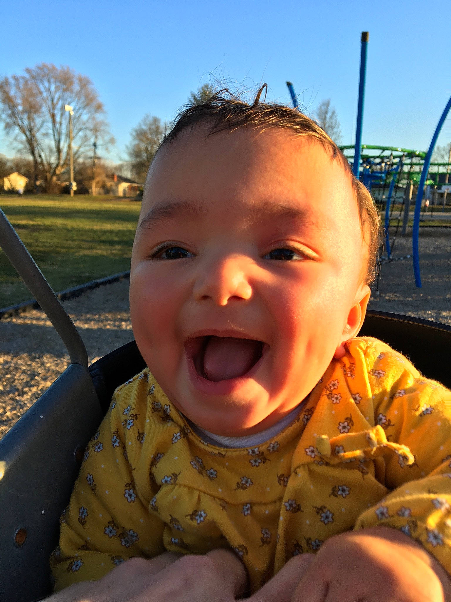 Sophia joined the competition — help win amazing prizes! baby, cheek, child, face, facial_expression, fun, grass, happy, head, laugh, mouth, nose, organ, person, playground, skin, sky, smile, toddler, tongue