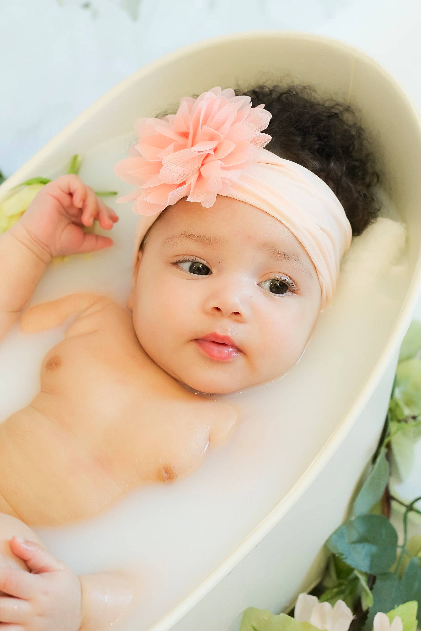 Kamiyah is registered to the contest to win money with this photo: baby, baby_toddler_clothing, cap, child, close_up, costume_hat, eyebrow, finger, flower, happy, hat, headband, headgear, headpiece, headwear, lip, person, petal, pink, skin
