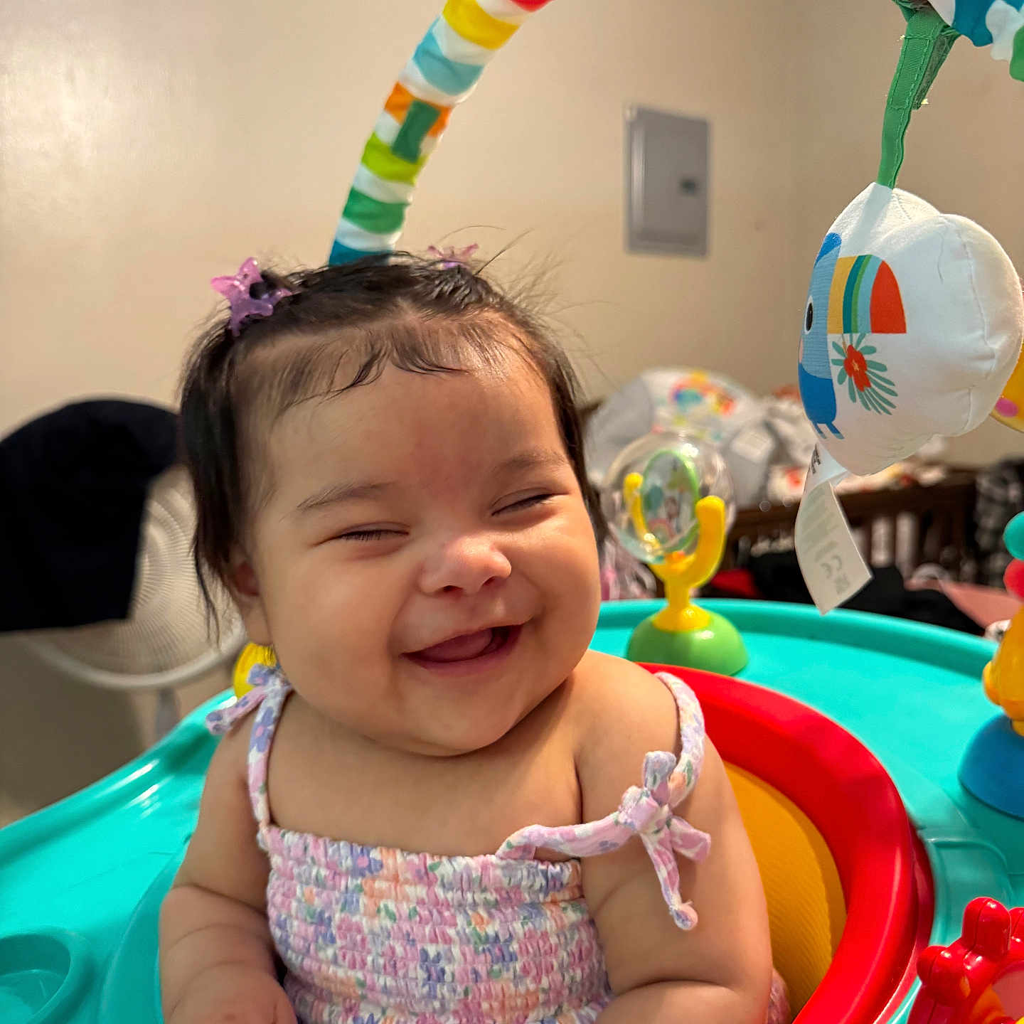 Araceli joined the competition — help win amazing prizes! activity_center, baby, baby_toy, child, childcare, clothing, colorful, cute, early_childhood, face, hairclip, happy, indoor, infant, joy, person, play, seat, smiling, toy