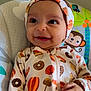 Wania joined the competition — help win amazing prizes! baby, child, headband, onesie, pumpkin, donut, monkey, baby_seat, smile, happy, infant, cute, patterned_clothing, orange, brown, white, playful, portrait, indoor, young_child