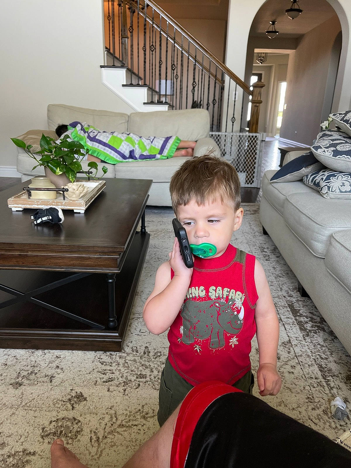 Julian joined the competition — help win amazing prizes! baby_toddler_clothing, black, chair, child, comfort, floor, flooring, hardwood, interior_design, living_room, person, plant, room, shorts, sitting, stairs, t_shirt, table, toddler, white