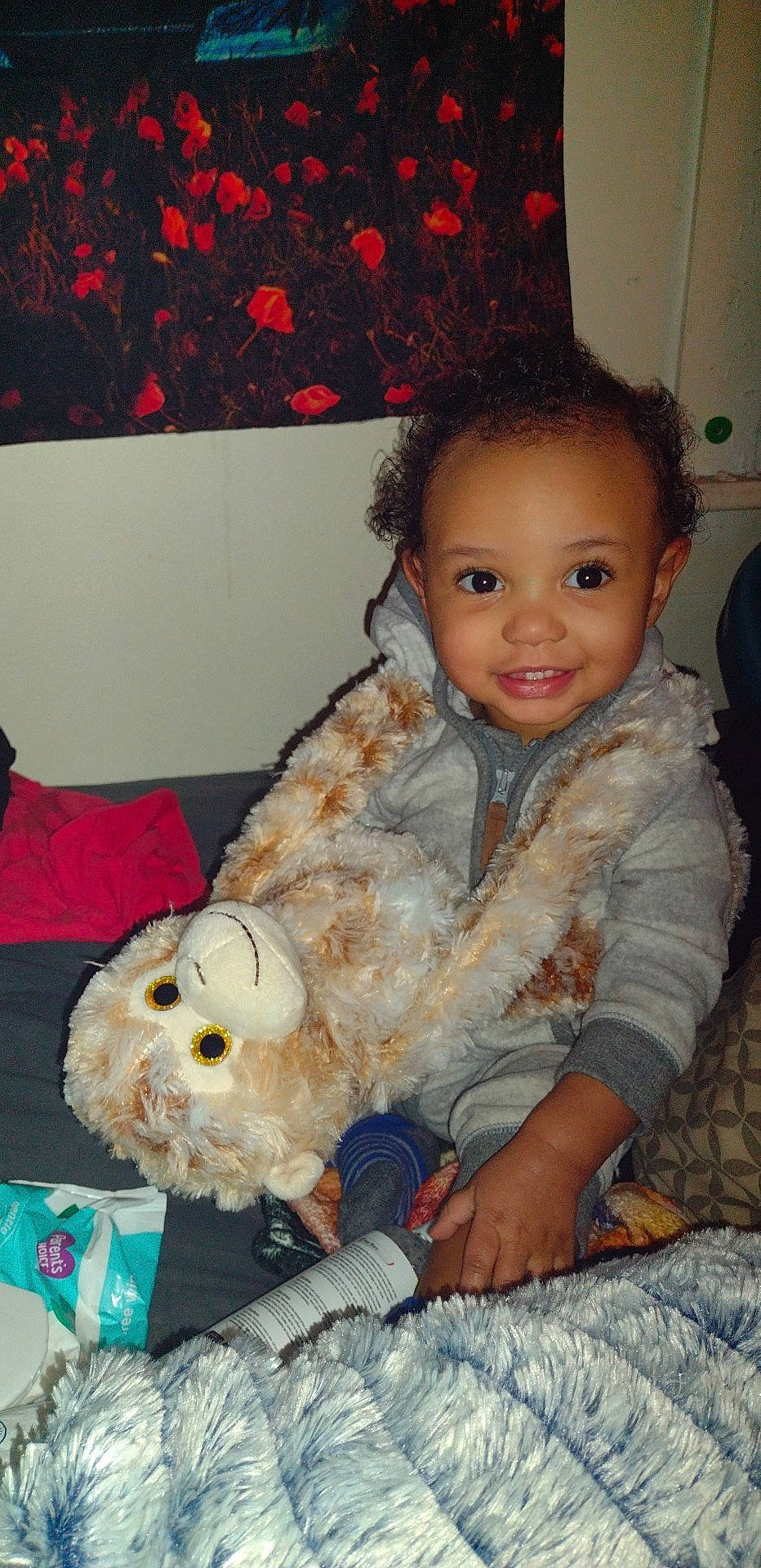 Marcel is registered to the contest to win money with this photo: baby_toddler_clothing, cheek, child, companion_dog, fun, fur, happy, head, joy, lap, nose, organ, person, pink, plush, room, skin, smile, stuffed_toy, textile