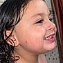 child, smiling, wet_hair, face, profile, bathroom, tiles, curtain, skin, young, happy, innocent, portrait, close_up, person, tooth, ear, cheek, shoulder, light