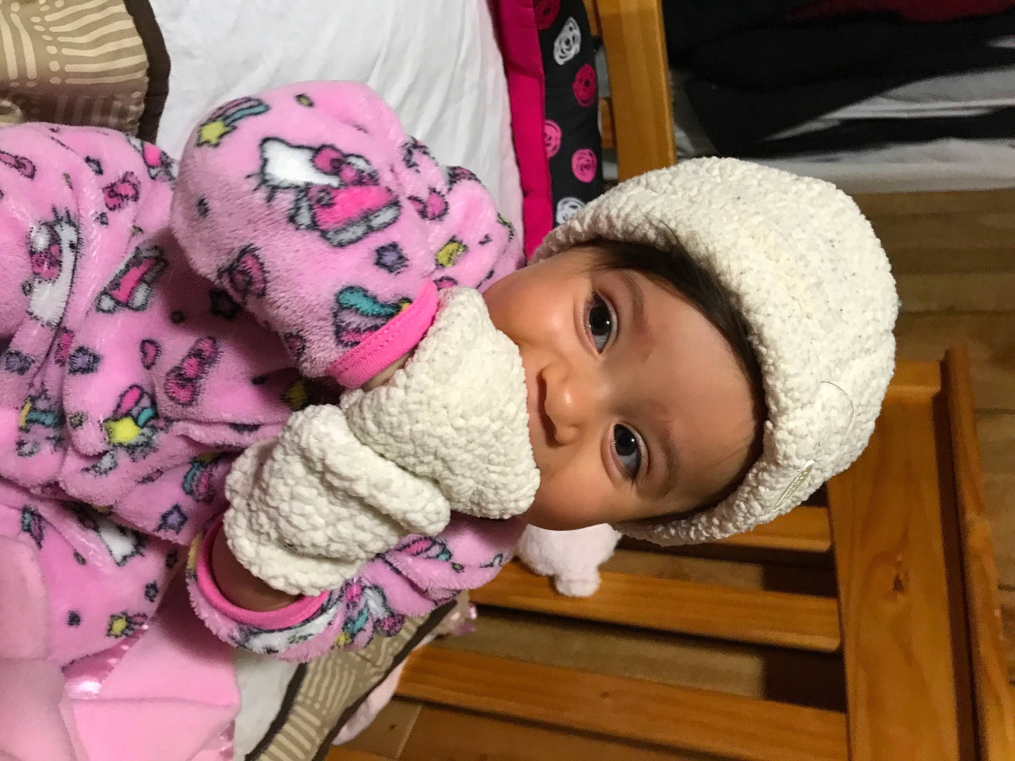 Ariella is registered to the contest to win money with this photo: baby, beanie, bonnet, cap, child, headgear, headwear, knit_cap, knitting, person, pink, toddler, wool