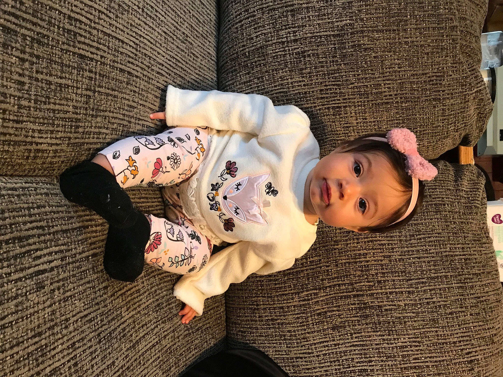 Ariella is registered to the contest to win money with this photo: baby, baby_products, baby_toddler_clothing, cheek, child, foot, home_accessories, linens, nightwear, nose, person, toddler