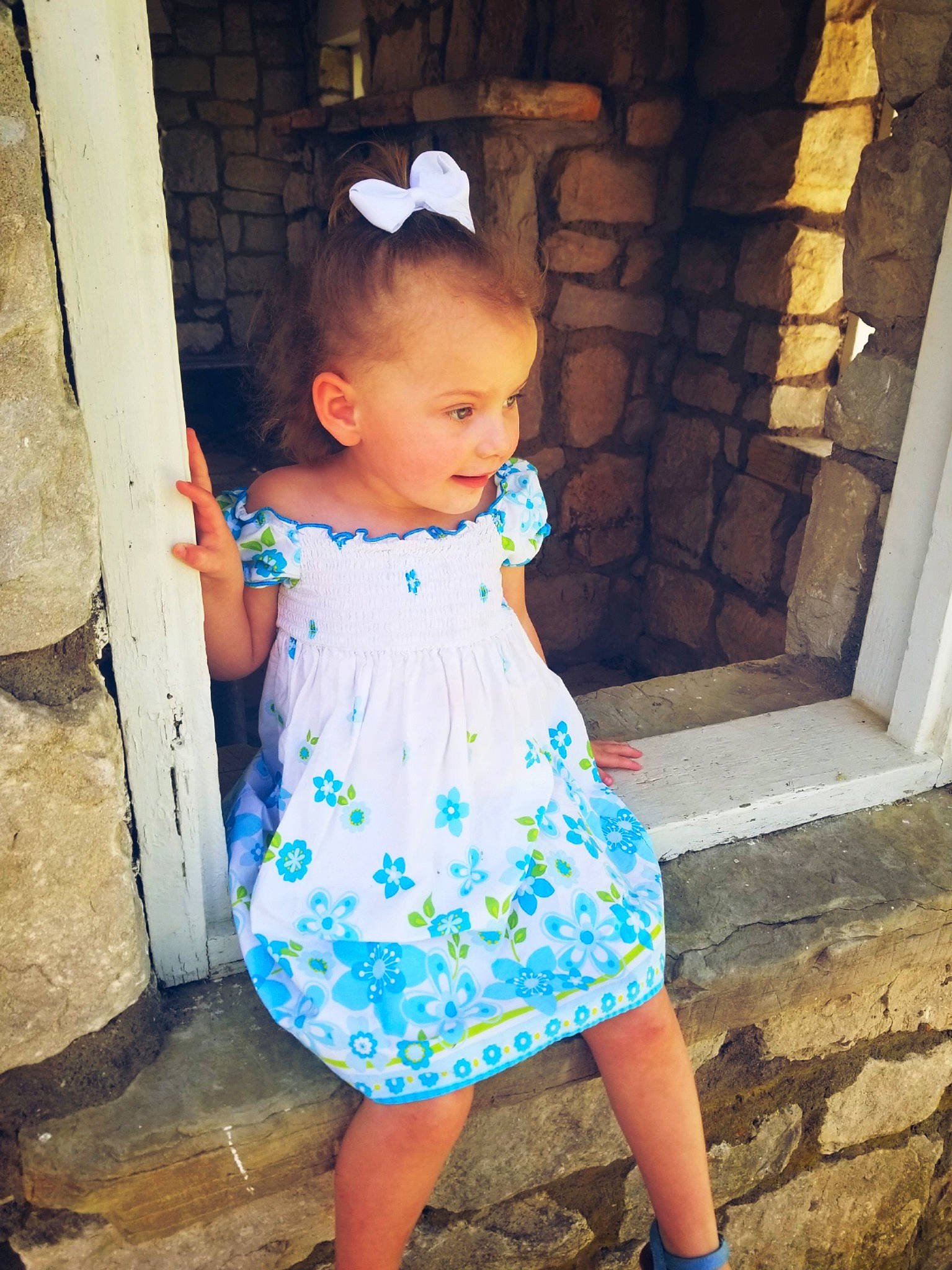 Mazelyn is registered to the contest to win money with this photo: baby, baby_toddler_clothing, blue, child, dress, joy, pattern, person, shoe, skin, smile, standing, summer, toddler, turquoise, vacation