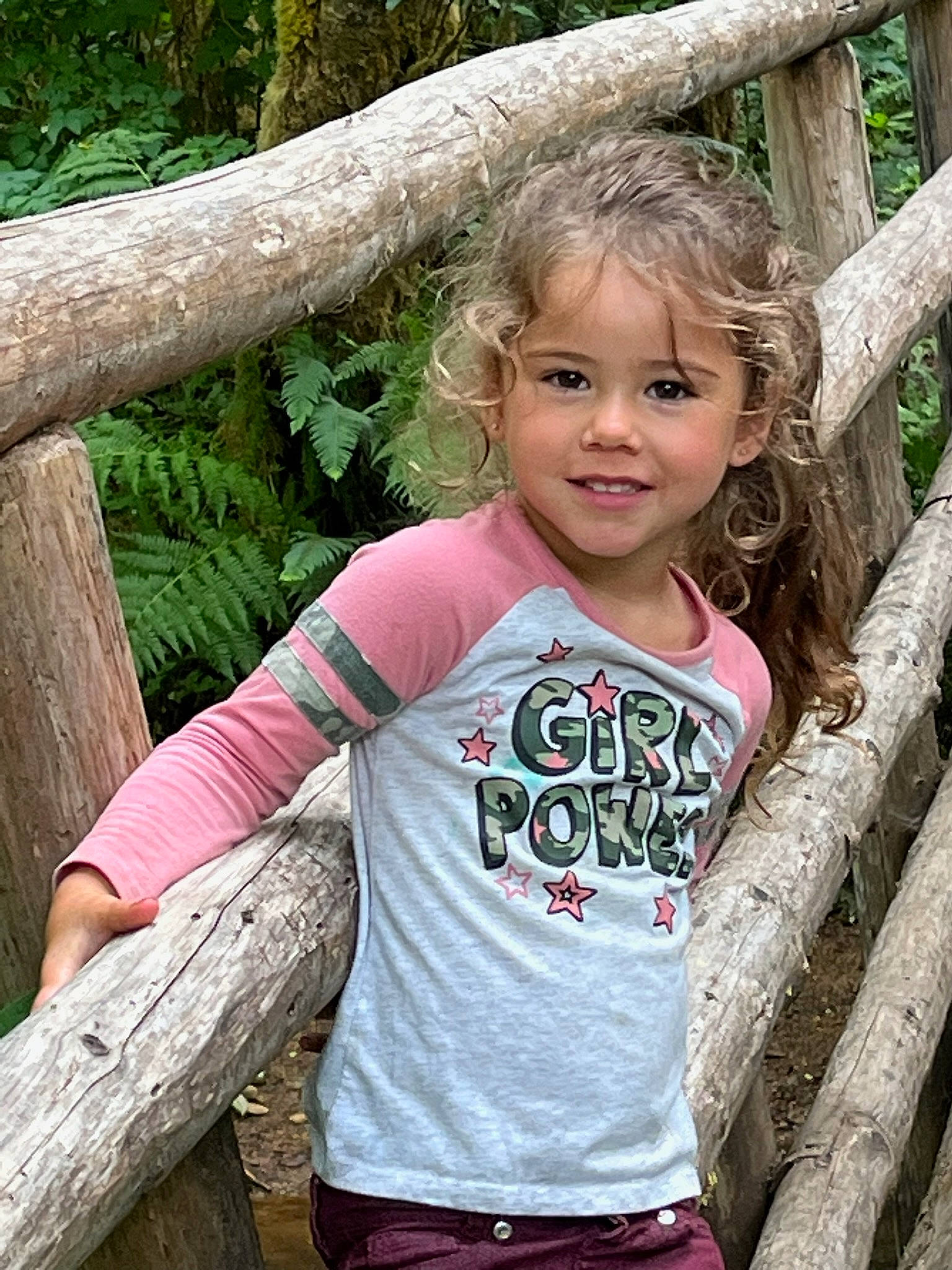 Maia is registered to the contest to win money with this photo: baby_toddler_clothing, blond, botany, child, forest, fun, grass, happy, iris, joy, leisure, people_in_nature, person, plant, skin, sleeve, smile, toddler, tree, trunk