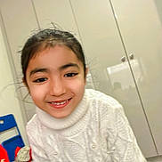 Lavina joined the competition — help win amazing prizes! child, smiling, white_sweater, knitted, turtleneck, indoor, wardrobe, furniture, young_girl, face, person, happy, portrait, clothing, long_sleeves, casual, cute, childhood, home, playful