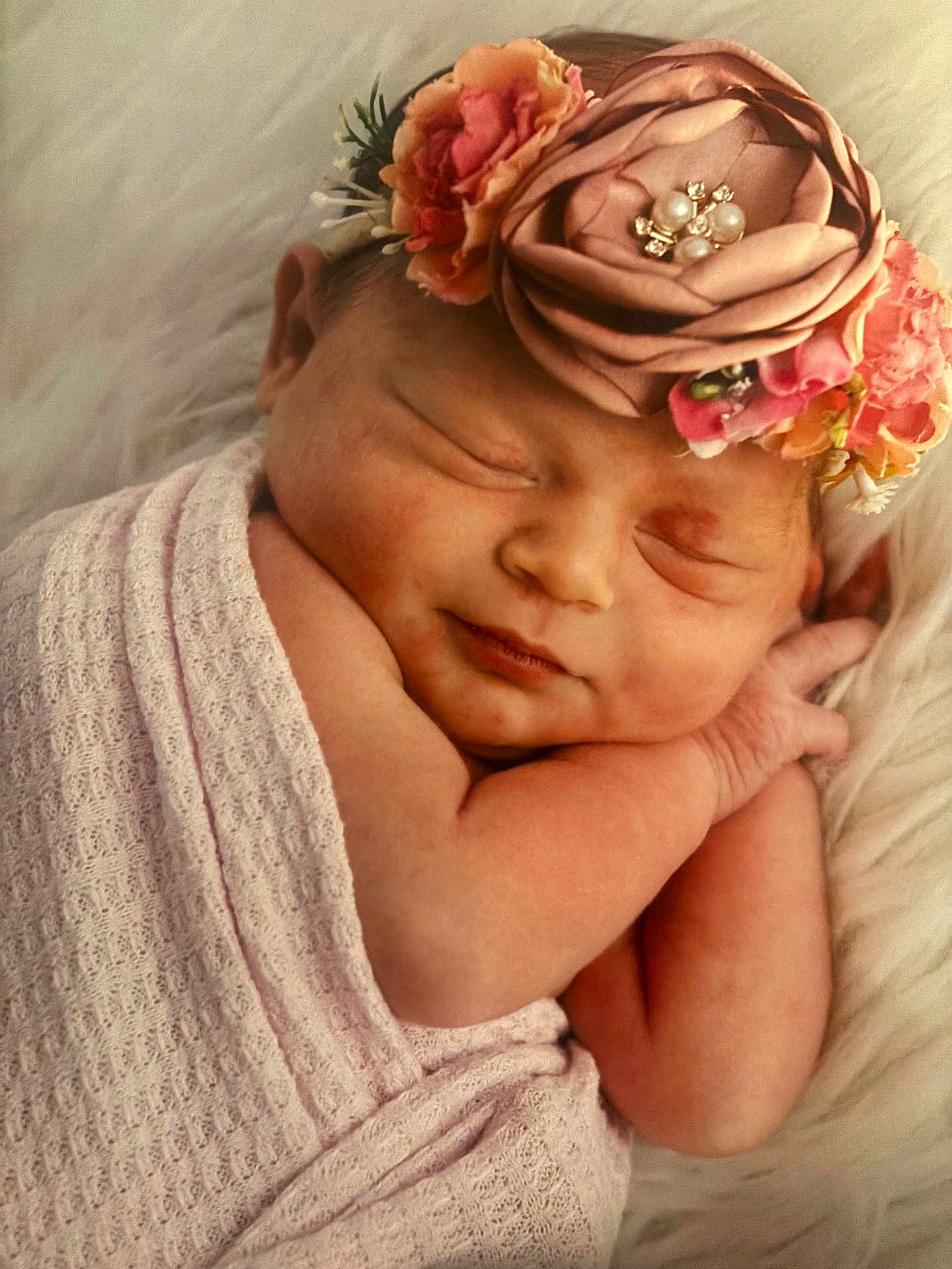 Reina joined the competition — help win amazing prizes! newborn, baby, sleeping, flower_crown, blanket, wrapped, infant, cute, soft_texture, peaceful, portrait, closeup, skin, headband, pink, resting, tiny_hands, cozy, face, child