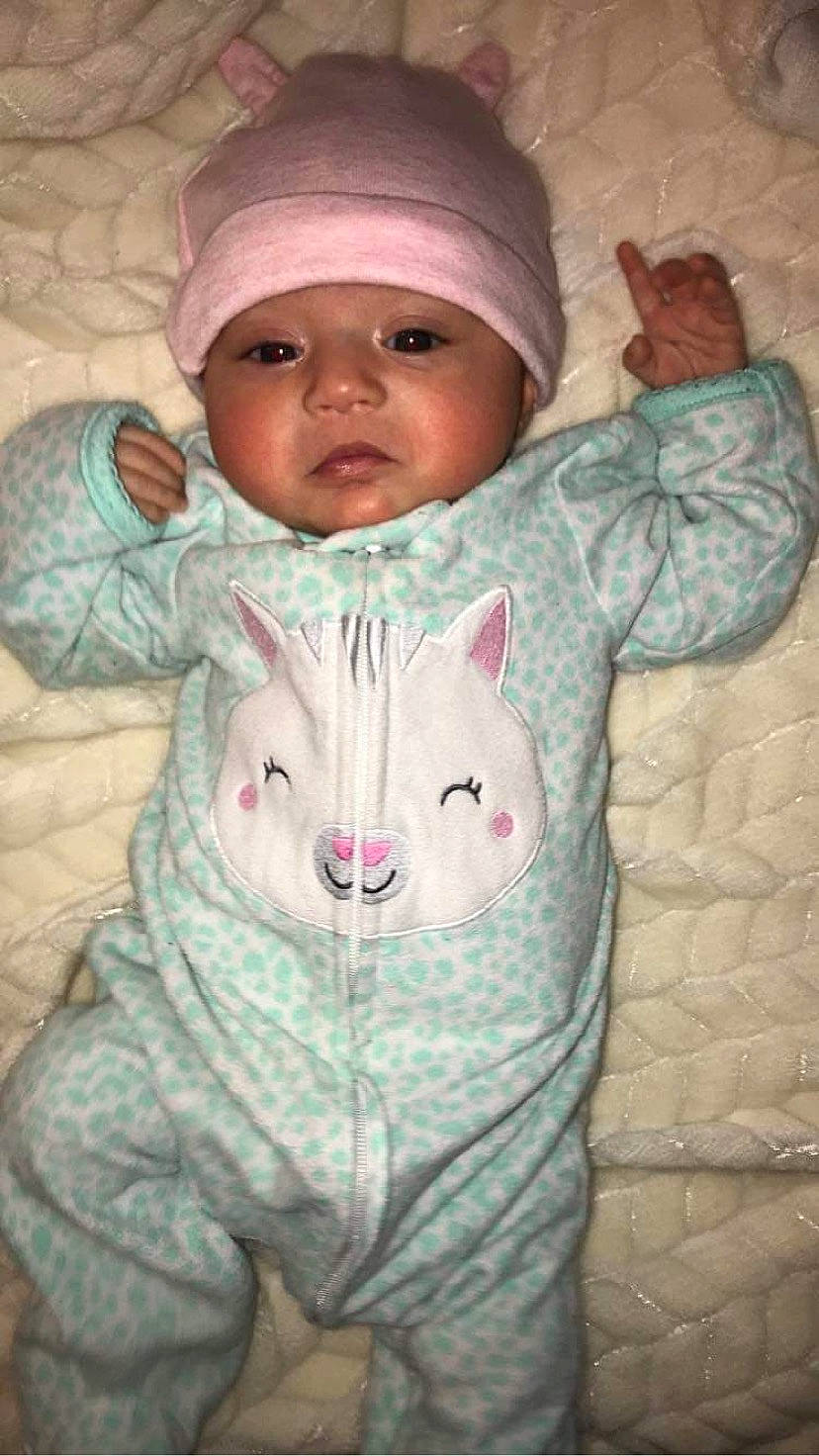 Ava Nichole joined the competition — help win amazing prizes! baby, baby_toddler_clothing, cheek, chin, eye, eyebrow, face, finger, forehead, head, headwear, human_body, jacket, lip, mouth, nose, organ, outerwear, person, pink