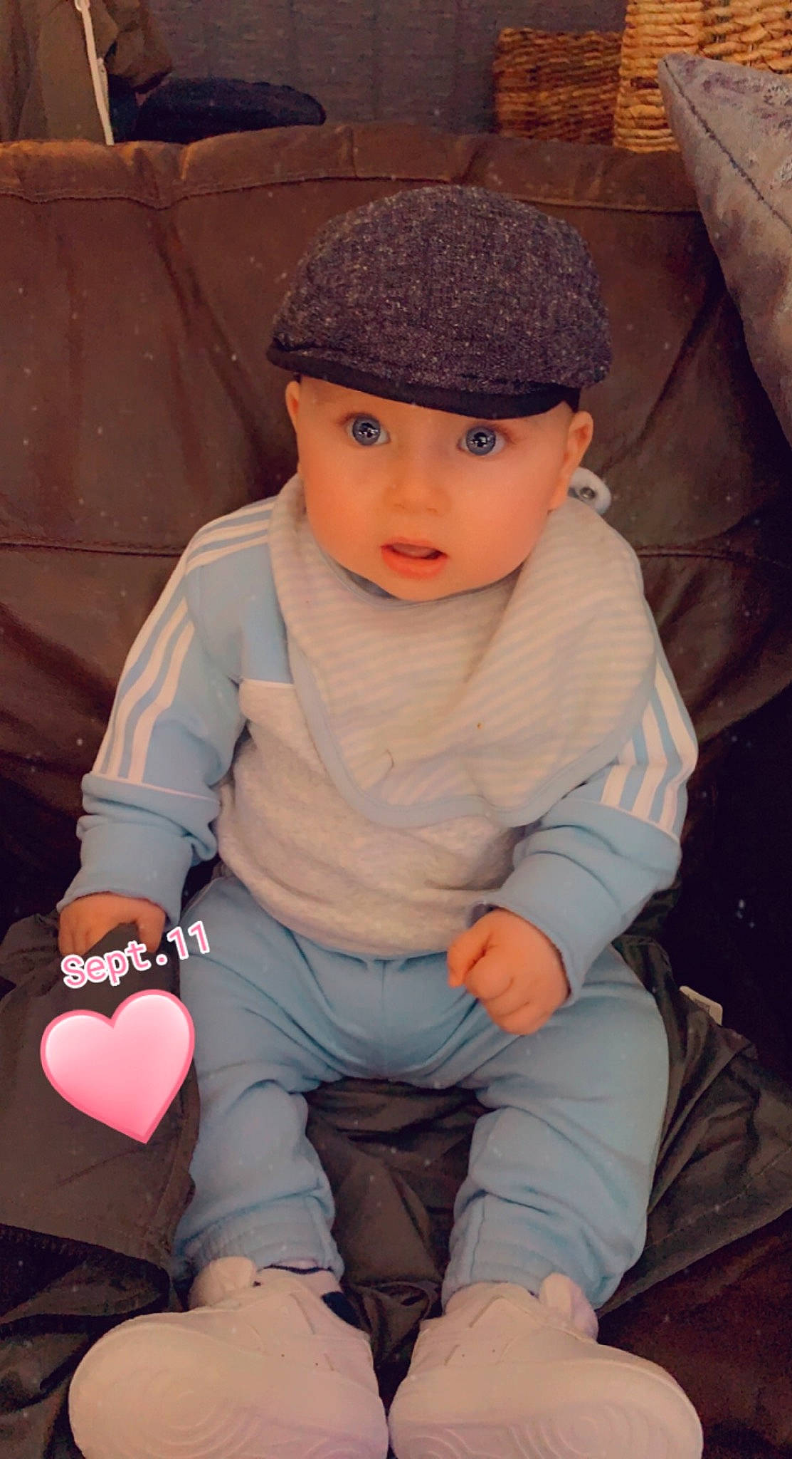 Kobe-kye joined the competition — help win amazing prizes! baby, baby_toddler_clothing, cap, cheek, child, comfort, cool, elbow, finger, fun, headwear, human_leg, knee, lap, person, sitting, skin, sleeve, thigh, toddler