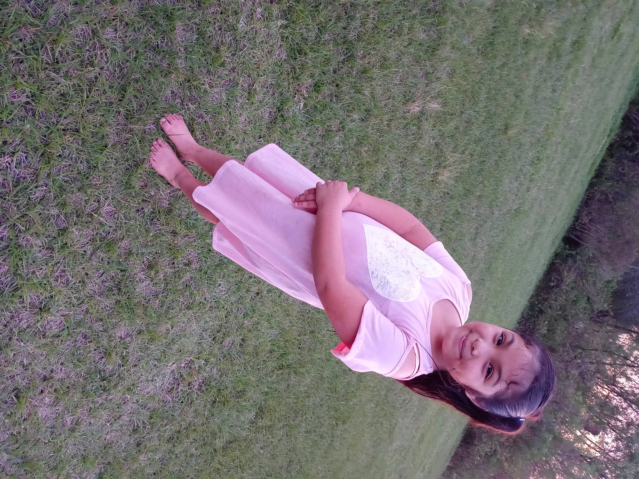 Jade is registered to the contest to win money with this photo: fashion_accessory, fun, grass, grass_family, happy, joy, landscape, leisure, magenta, people_in_nature, person, pink, plant, purple, smile, soil, tints_and_shades, tree, wood