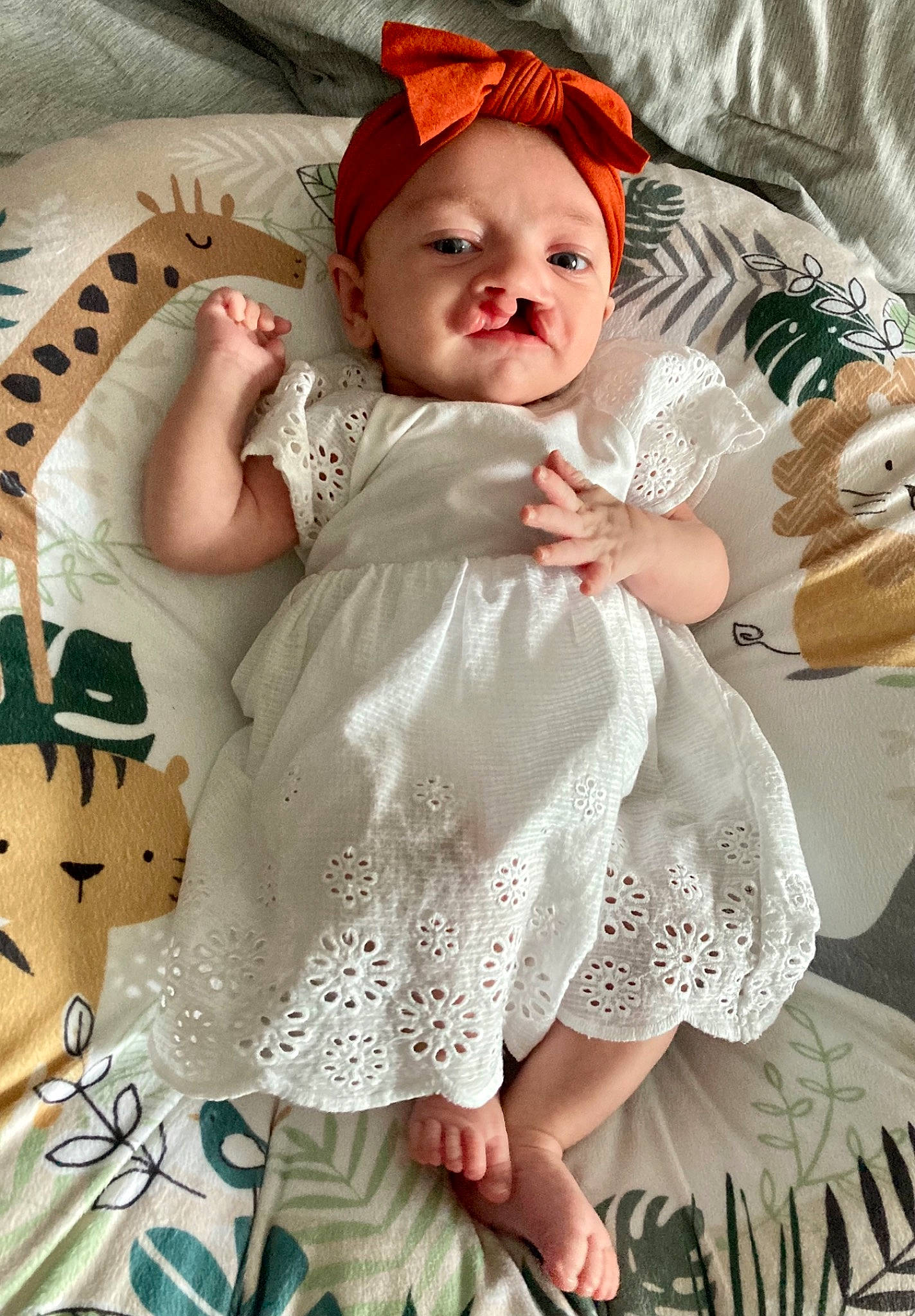 Myla Rose joined the competition — help win amazing prizes! baby, baby_toddler_clothing, cheek, child, dress, eye, face, finger, hand, happy, headgear, iris, lip, pink, skin, sleeve, smile, textile, toddler, white