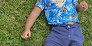 Noé a rejoint le concours — aidez-le/la à gagner de superbes lots ! baby, blue_shirt, cap, child, cute, feet, grass, happy, joyful, laying, nature, outdoor, person, playful, portrait, sandals, shorts, smiling, summer, toddler