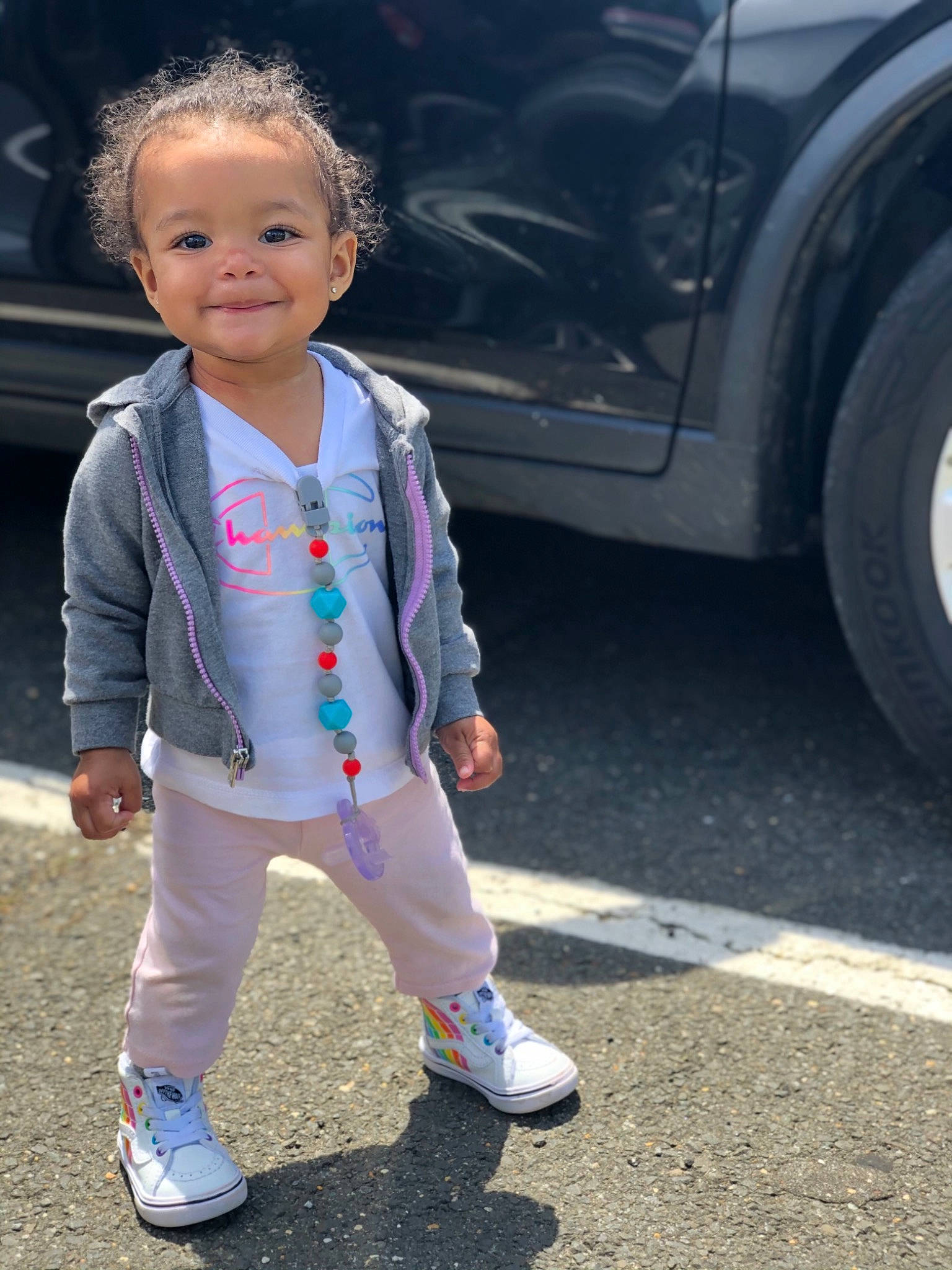 Kynsleigh joined the competition — help win amazing prizes! asphalt, automotive_lighting, automotive_tire, baby_toddler_clothing, electric_blue, face, fender, footwear, fun, happy, joy, person, road_surface, shoe, smile, snapshot, sneakers, street_fashion, tire, toddler