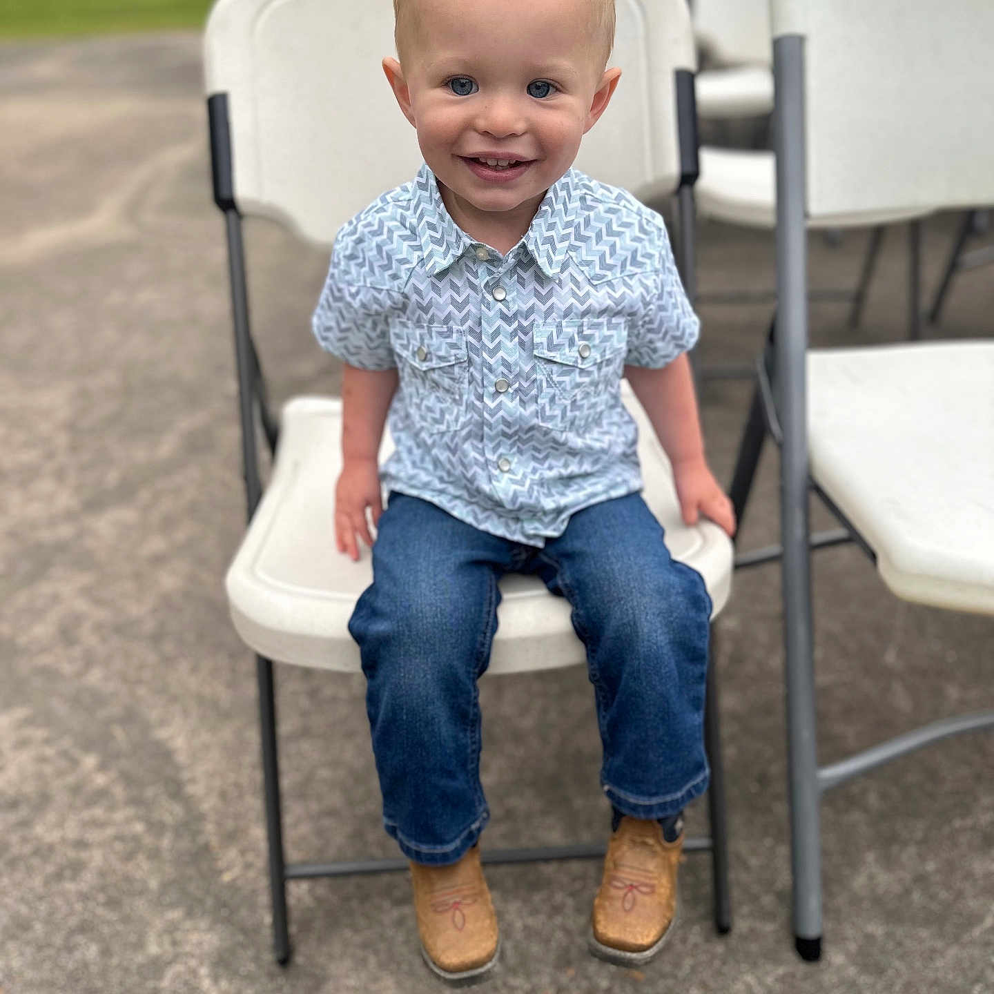 Wesley joined the competition — help win amazing prizes! baby, car, chair, clothing, face, footwear, furniture, grass, head, jeans, machine, pants, person, photography, plant, portrait, shoe, sitting, transportation, vehicle