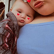 Jaxson is registered to the contest to win money with this photo: adult, affection, blue_clothing, casual, cheeks, child, closeup, cute, emotion, face, glasses, hand, heart_sticker, indoor, person, plaid_shirt, portrait, selfie, skin, snuggle