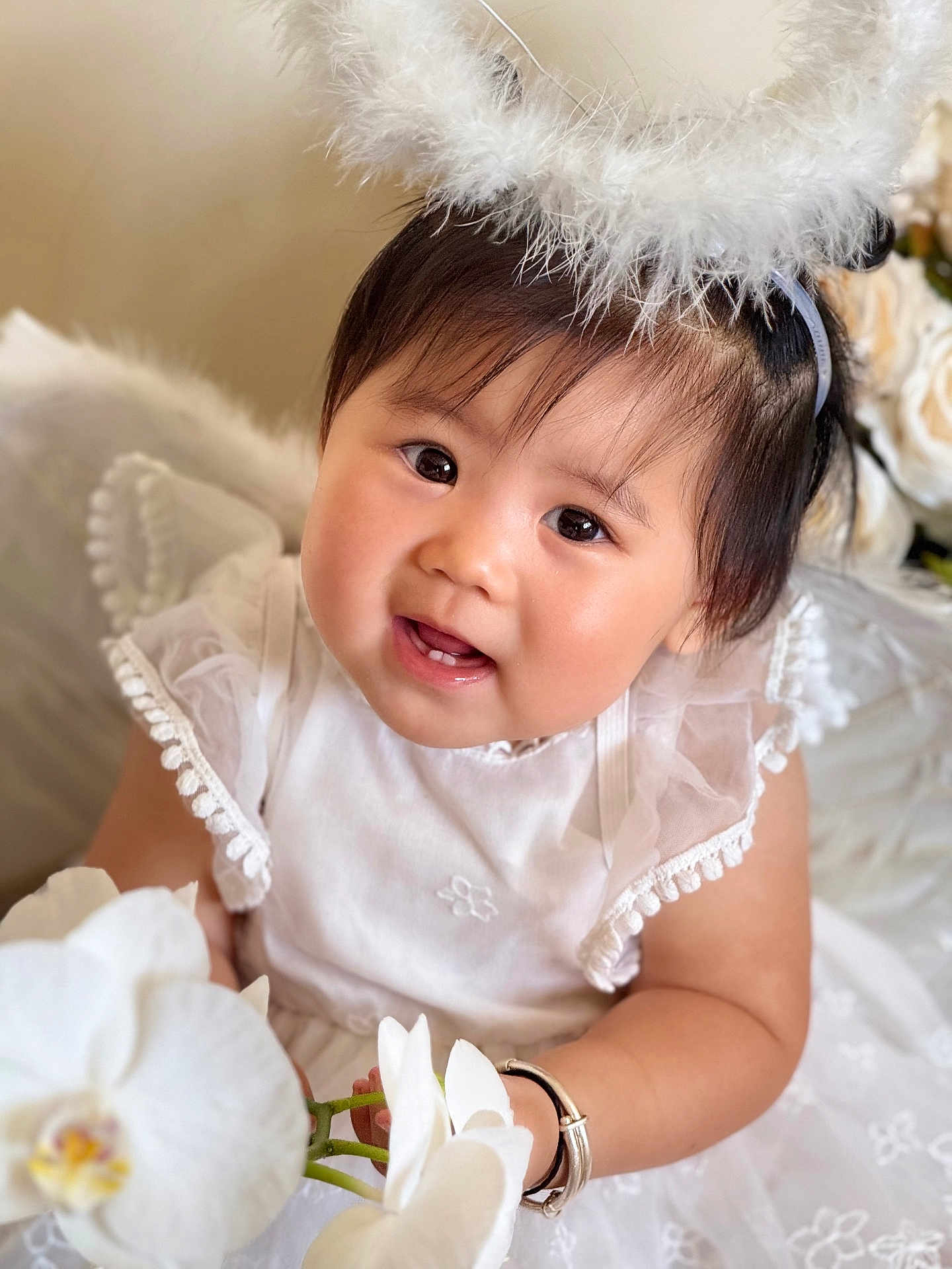 Misum Rai joined the competition — help win amazing prizes! baby, child, angel, halo, white_dress, flower, orchid, cute, smiling, portrait, infant, headband, soft_light, indoors, adorable, young_child, happy, closeup, celebration, costume