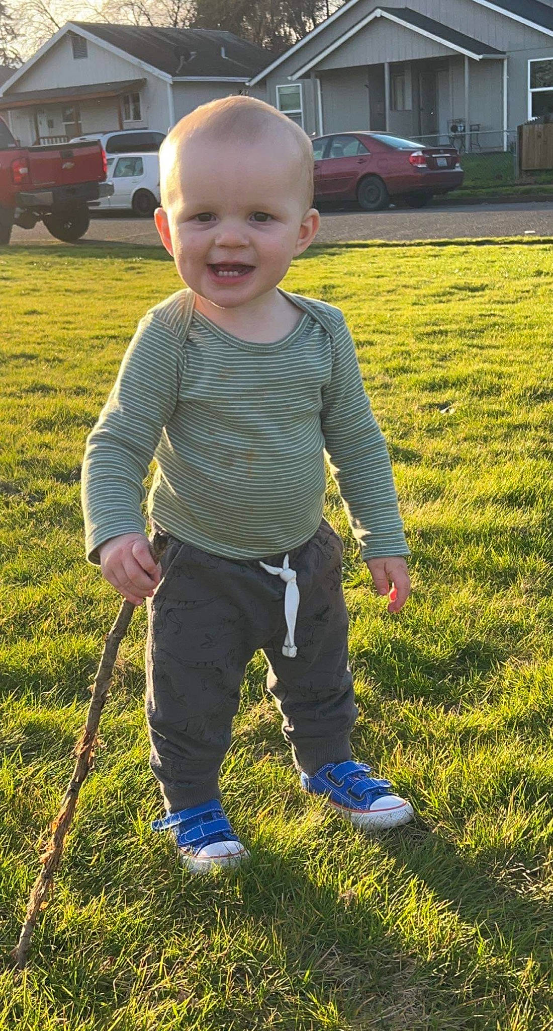 Bailey is registered to the contest to win money with this photo: baby, baby_toddler_clothing, car, child, fun, grass, grass_family, grassland, happy, joy, lawn, people_in_nature, person, plant, recreation, smile, standing, t_shirt, tire, toddler