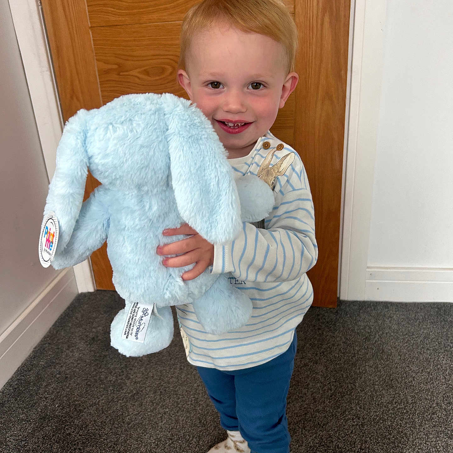 Freddy joined the competition — help win amazing prizes! baby, bodypart, clothing, door, face, footwear, hardwood, head, indoors, interiordesign, jeans, knitwear, pants, person, photography, portrait, shoe, sweater, toy, wood