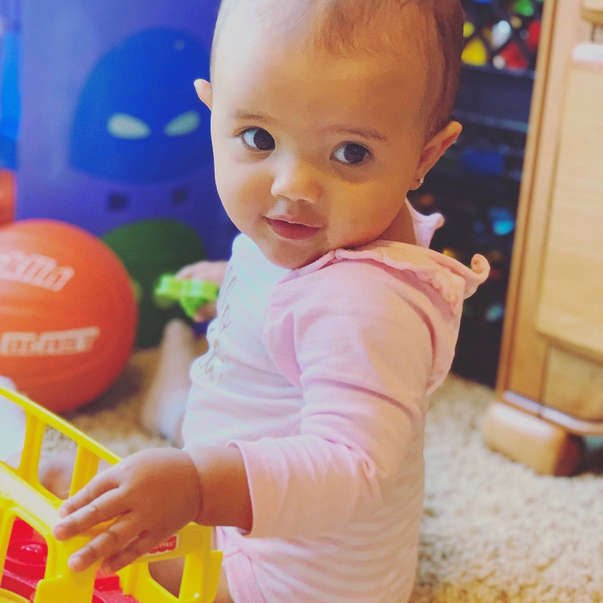 Amiyah is registered to the contest to win money with this photo: baby, baby_playing_with_toys, ball, beauty, cheek, child, eye, happy, person, play, product, room, skin, smile, toddler, toy, tummy_time, yellow