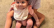 Xyena is registered to the contest to win money with this photo: children, siblings, baby, toddler, girl, sisters, portrait, smiling, sitting, hugging, indoor, home, carpet, floor, clothing, dress, shirt, socks, shoes, family