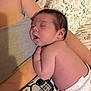 Vida is registered to the contest to win money with this photo: arm, baby, blanket, cartoon, closeup, cozy, cute, diaper, family, indoor, infant, nap, newborn, peaceful, person, resting, skin, sleeping, soft_lighting, toddler