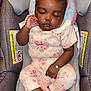 Jersi is registered to the contest to win money with this photo: baby, sleeping, car_seat, pink_bow, floral_outfit, fuzzy_booties, infant, child, cute, cozy, peaceful, portrait, clothing, accessory, seat, soft, rest, adorable, young_child, indoor