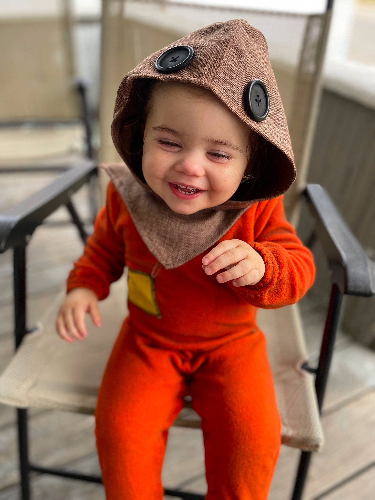 Scarlet is registered to the contest to win money with this photo: active_pants, baby, baby_toddler_clothing, baseball_cap, cap, child, eyewear, face, fashion_accessory, fun, happy, hat, headwear, joy, orange, person, personal_protective_equipment, skin, sleeve, smile