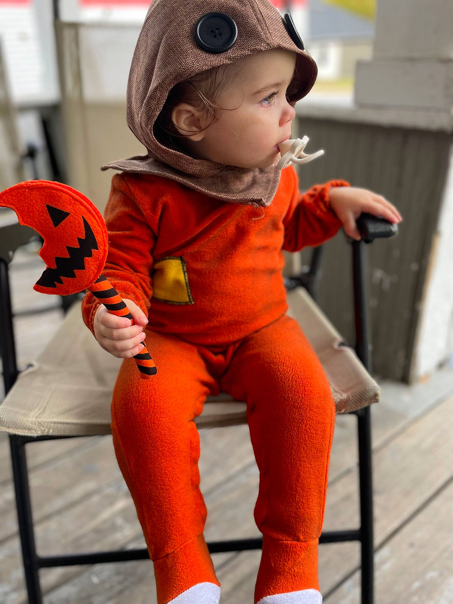 Scarlet joined the competition — help win amazing prizes! animation, baby, cap, carmine, child, cool, costume, doll, fashion_accessory, fictional_character, fur, headgear, headwear, orange, person, personal_protective_equipment, plush, sleeve, stuffed_toy, toddler