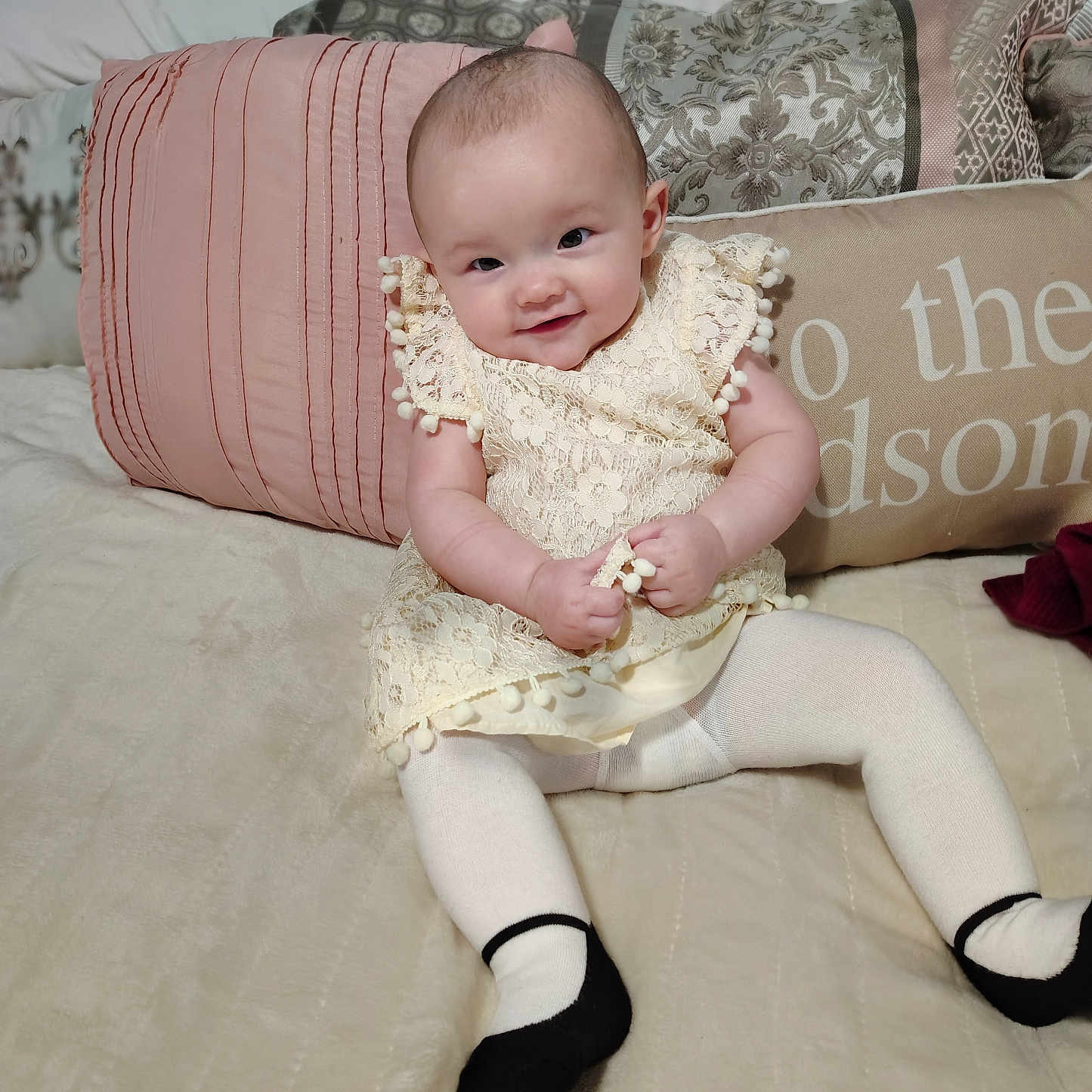 Ariella is registered to the contest to win money with this photo: baby, bodypart, clothing, couch, cushion, face, finger, footwear, furniture, head, homedecor, hosiery, person, photography, pillow, portrait, sandal, shoe, sitting, sock