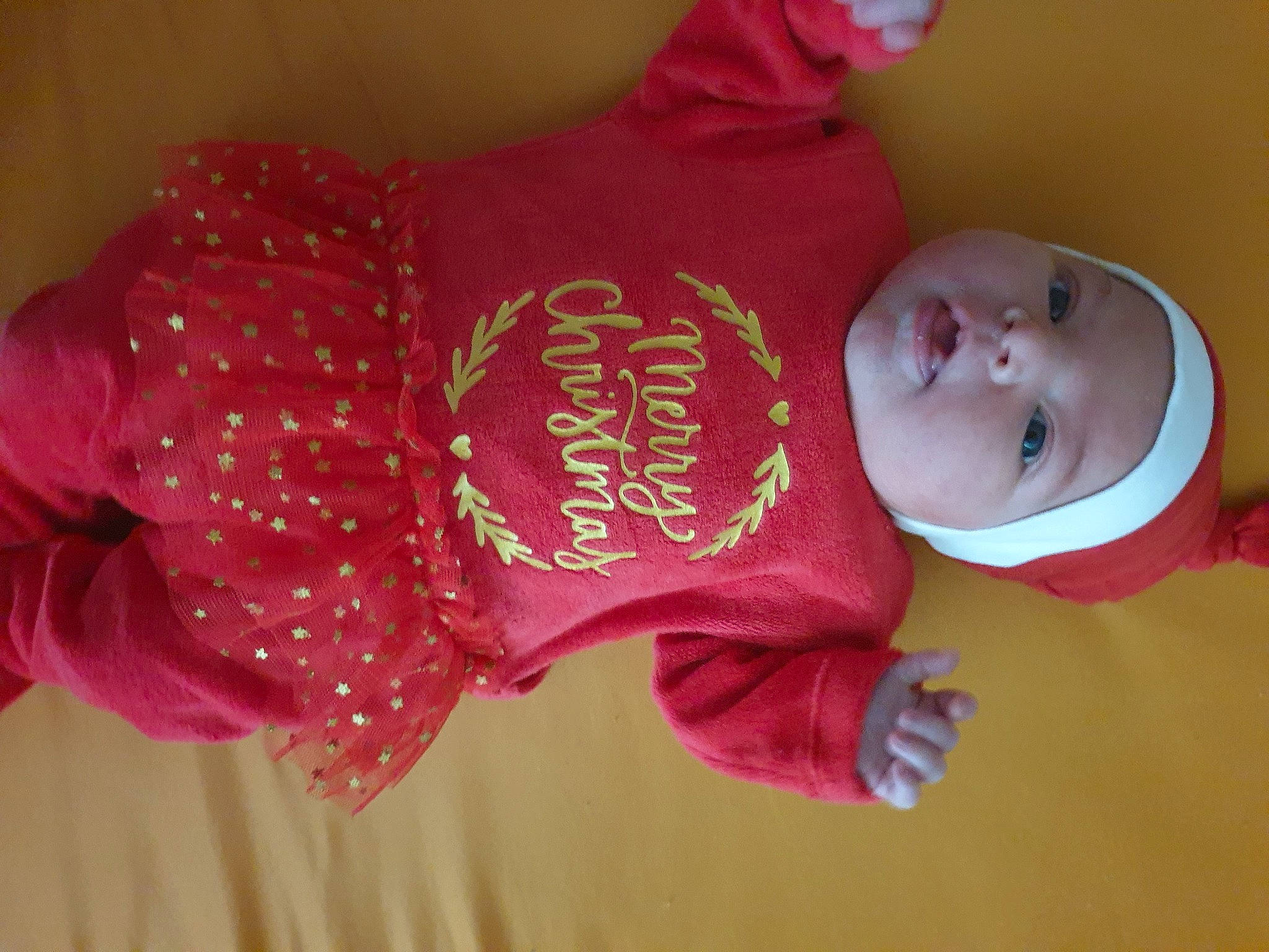 Ariana participe au concours pour gagner de l'argent avec cette photo : baby, baby_products, baby_toddler_clothing, carmine, child, comfort, font, headgear, headwear, magenta, outerwear, pattern, peach, person, petal, pink, sleeve, t_shirt, toddler, top