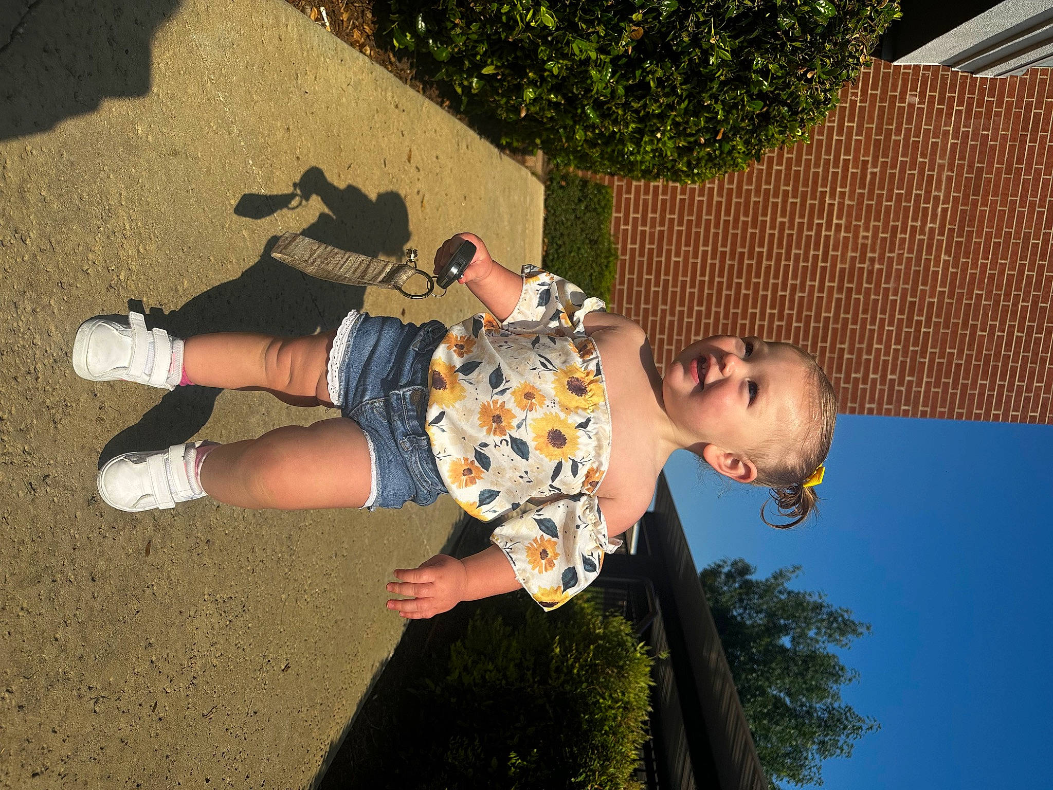 Anelise joined the competition — help win amazing prizes! child, eyewear, fun, grass, happy, human_leg, knee, leisure, people_in_nature, person, plant, sky, t_shirt, thigh, tree, walking_shoe