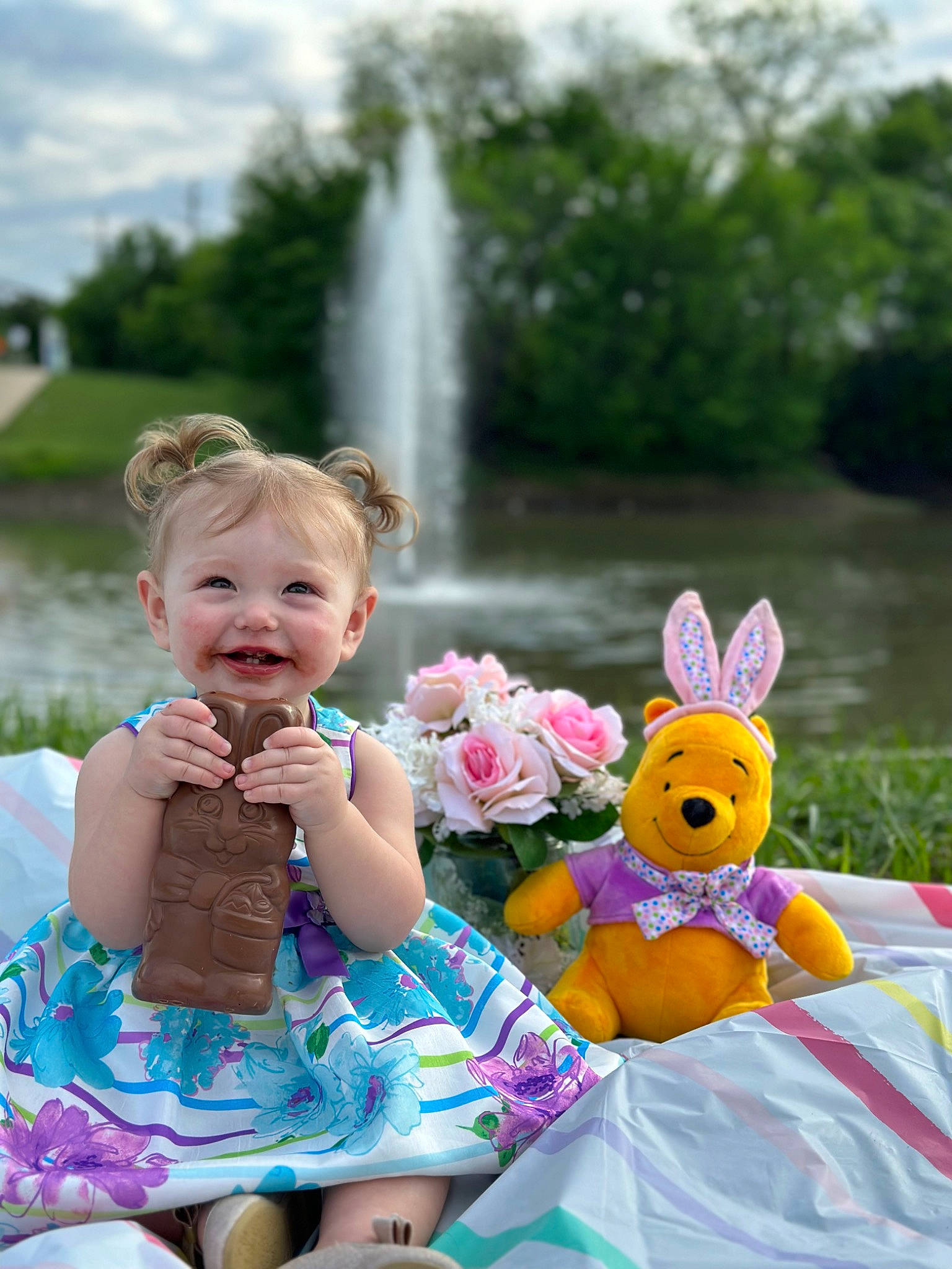 Anelise is registered to the contest to win money with this photo: baby_toddler_clothing, dress, flower, fun, grass, green, happy, joy, leisure, people, people_in_nature, person, pink, plant, recreation, sky, smile, summer, toddler, tree