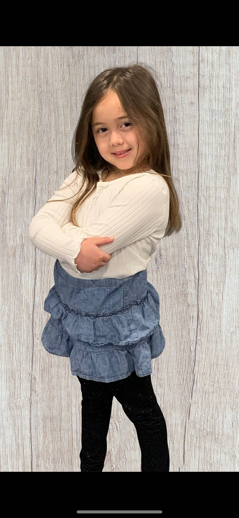 Kayla is registered to the contest to win money with this photo: arm, face, flash_photography, gesture, grey, hair, happy, human_body, iris, joint, joy, knee, lip, neck, person, skin, sleeve, smile, standing, textile