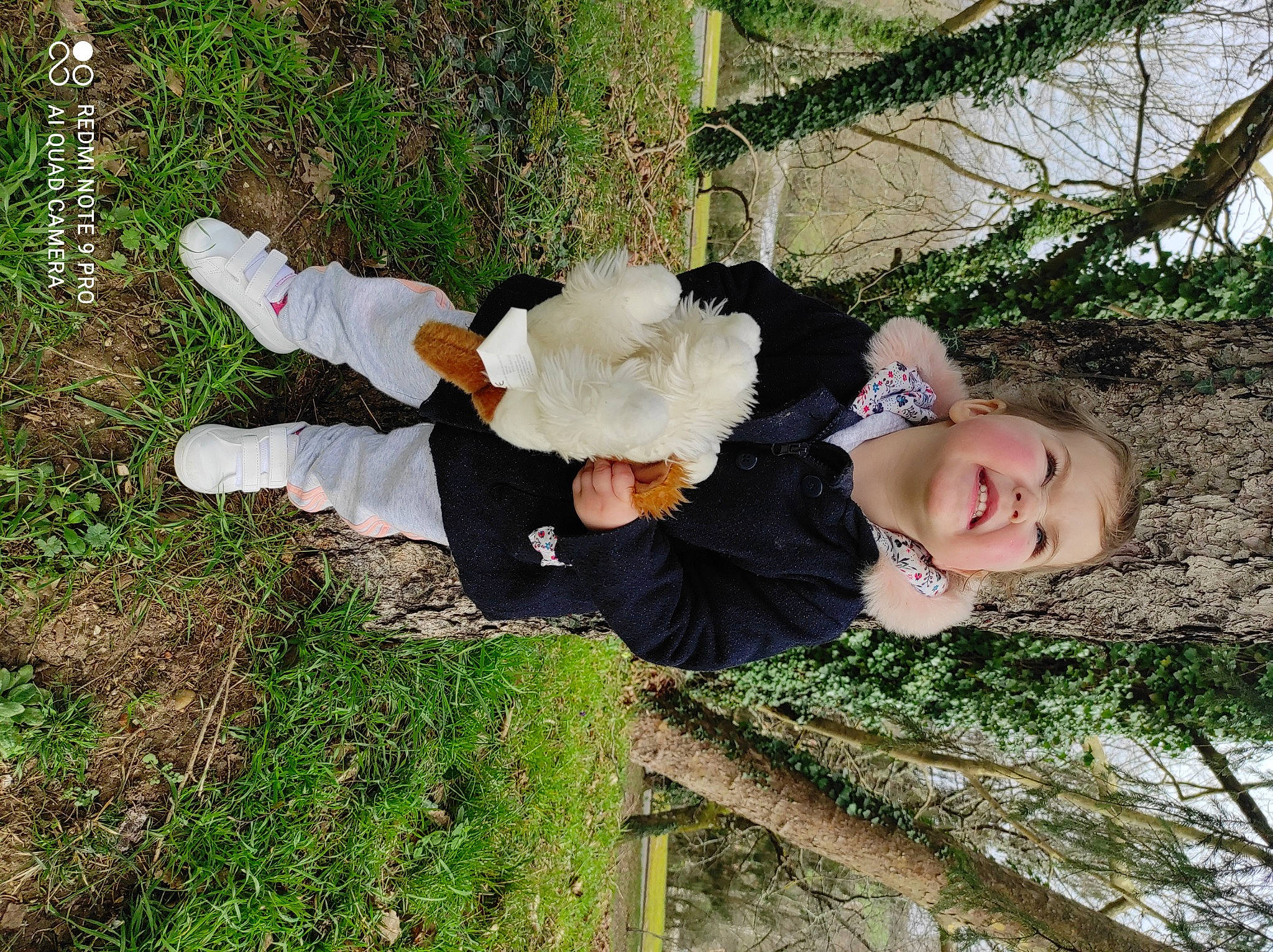 Athéna participe au concours pour gagner de l'argent avec cette photo : baby, baby_toddler_clothing, child, fun, fur, garden, grass, grass_family, happy, hat, joy, leisure, people_in_nature, person, plant, smile, toddler, tree, wood