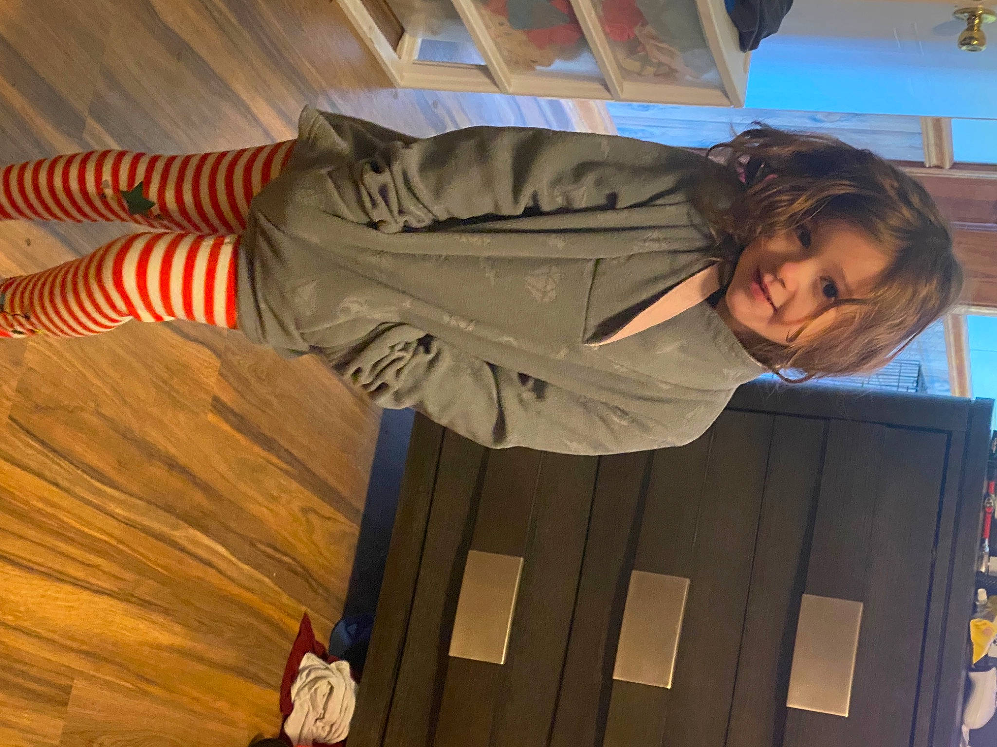 Alyzabeth is registered to the contest to win money with this photo: flooring, fun, gesture, hardwood, human_leg, landscape, orange, pattern, person, room, sportswear, street_fashion, suit, tree, varnish, wood, wood_flooring, wood_stain