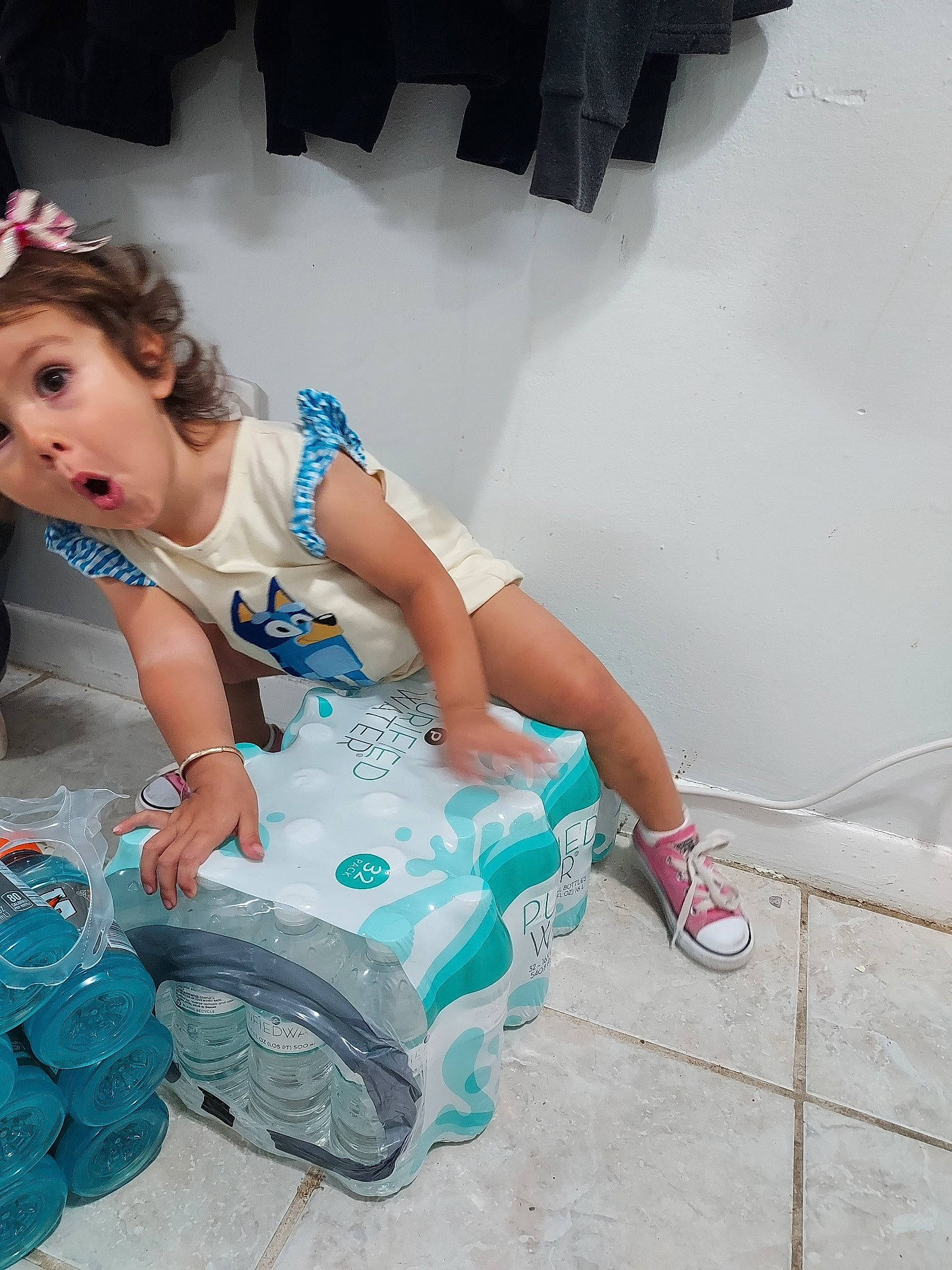 Korra joined the competition — help win amazing prizes! baby, baby_products, baby_toddler_clothing, child, electric_blue, event, fashion_accessory, flash_photography, fun, happy, headpiece, human_leg, leisure, magenta, party_supply, person, plastic, play, sandal, sitting