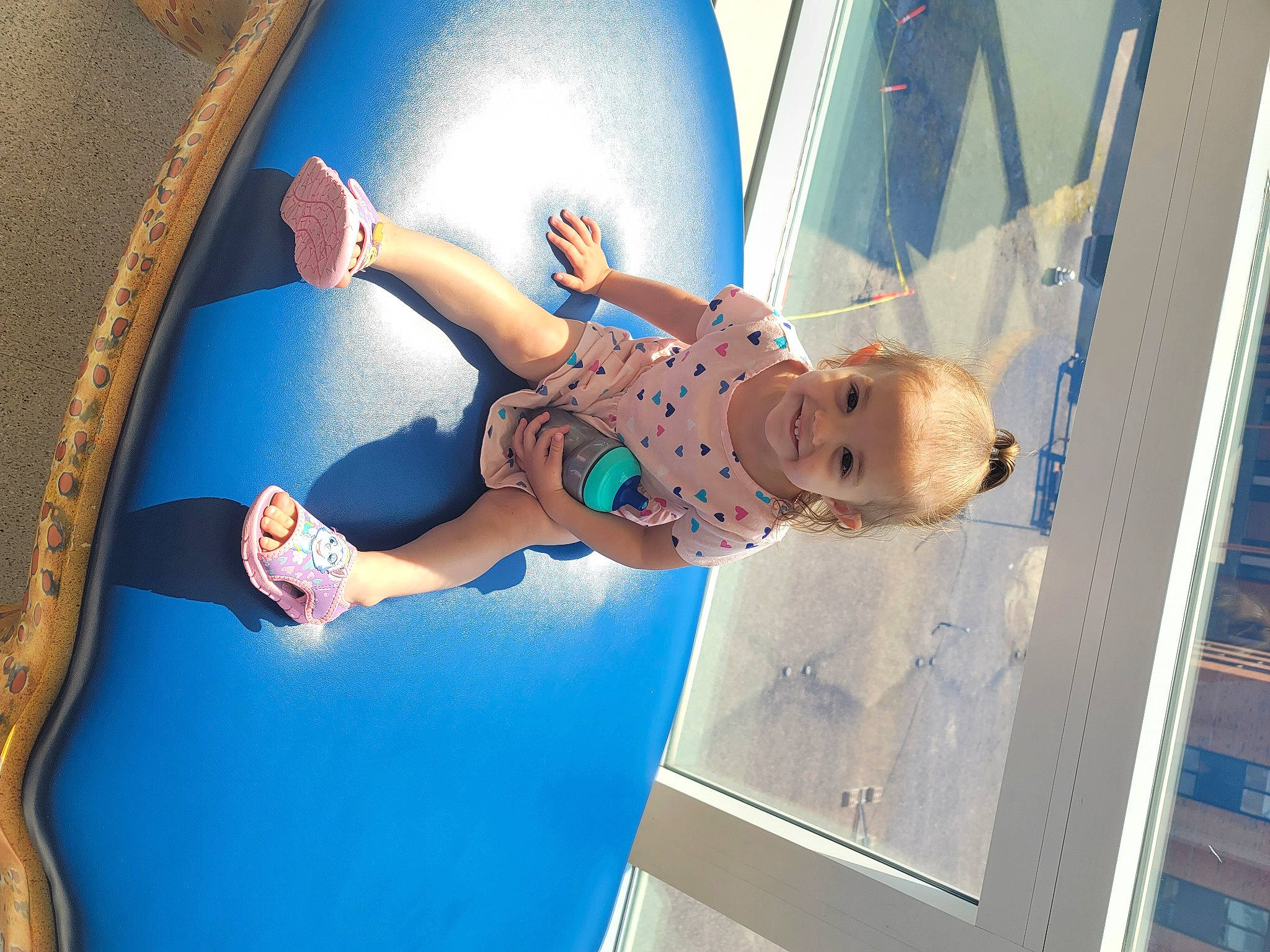 Jazmine joined the competition — help win amazing prizes! azure, blue, elbow, electric_blue, fun, happy, human_leg, joy, knee, leisure, person, recreation, reflection, room, stairs, thigh, toddler, vacation, water, world