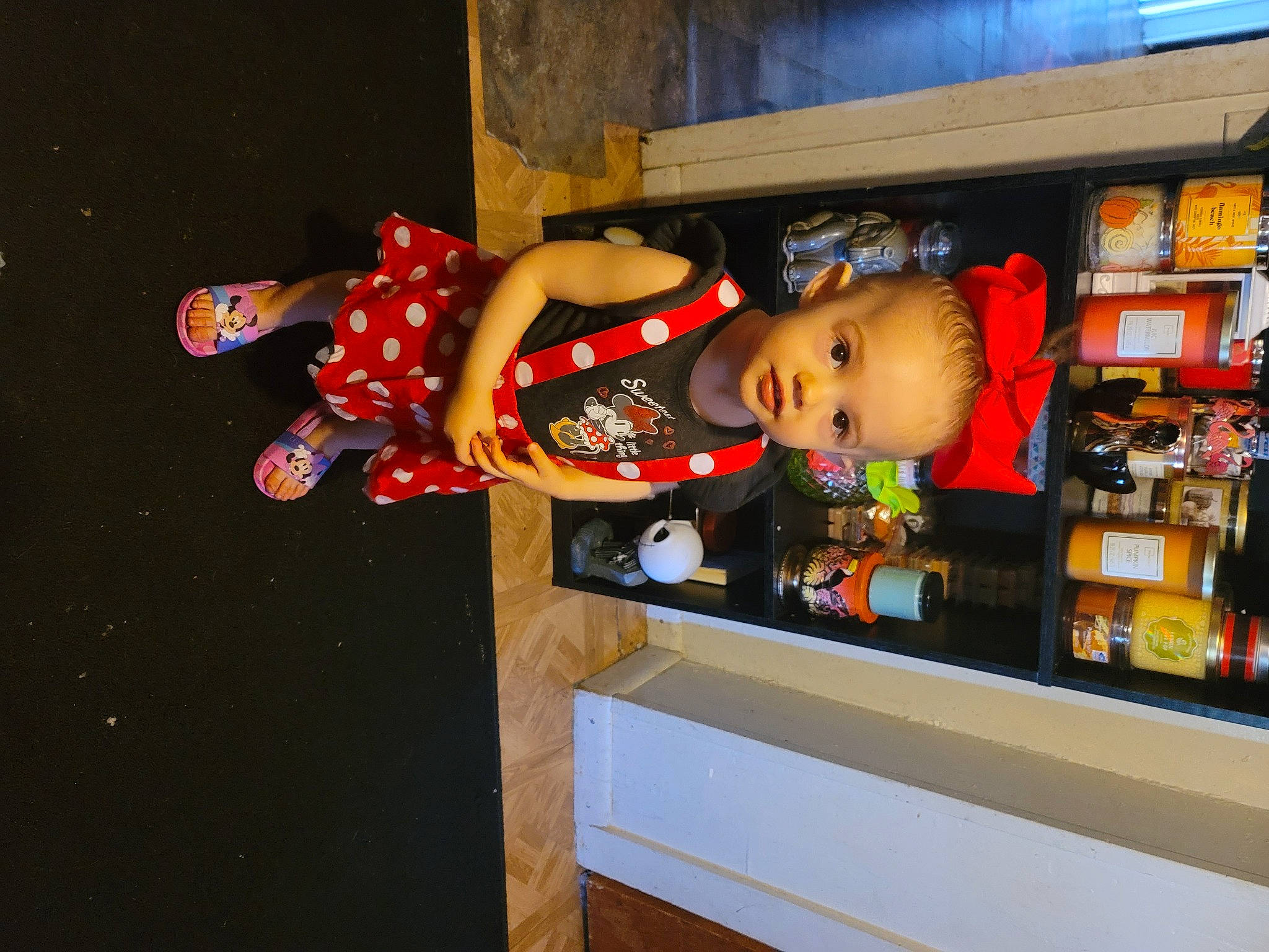 Jazmine joined the competition — help win amazing prizes! building, display_case, display_device, flat_panel_display, fun, games, home_appliance, machine, orange, person, recreation, retail, room, shelf, shelving, smile, television, television_set, tire, toddler