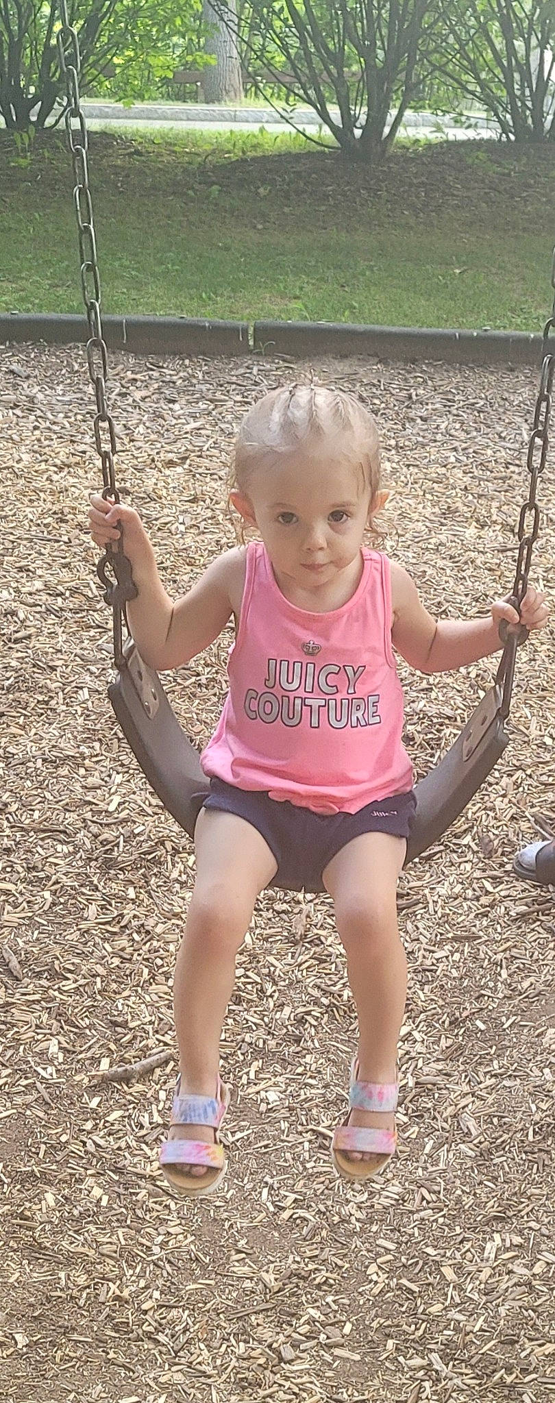 Jazmine joined the competition — help win amazing prizes! baby_toddler_clothing, child, chin, city, fun, grass, hairstyle, happy, leg, leisure, magenta, outdoor_play_equipment, person, pink, playground, recreation, sandal, smile, swing, thigh