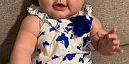 Emma is registered to the contest to win money with this photo: baby, beige, blue_butterflies, bow, child, chubby_arms, closeup, couch, curious, cute, drool, happy, headband, indoors, infant, legs, portrait, sitting, soft_lighting, white_outfit
