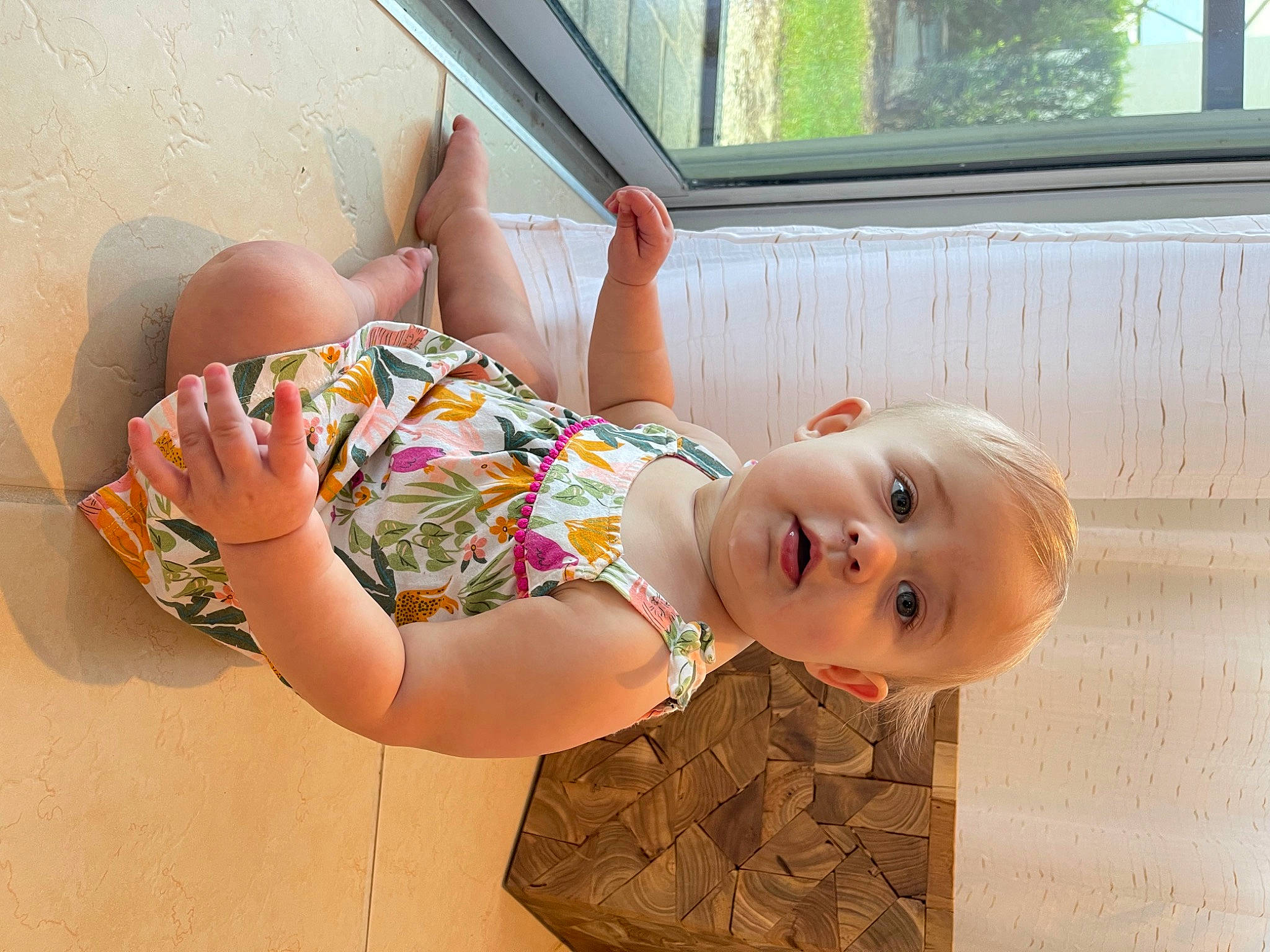 Elsie is registered to the contest to win money with this photo: arm, dress, fun, glasses, grass, happy, human_leg, joint, leisure, person, pink, plant, skin, smile, summer, surprise, thigh, toddler, tree, waist