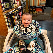 Dekaine is registered to the contest to win money with this photo: accessories, adult, architecture, art, baby, babylaughing, bag, book, bookcase, building, chair, clothing, cushion, cutlery, diningroom, diningtable, face, footwear, furniture, handbag