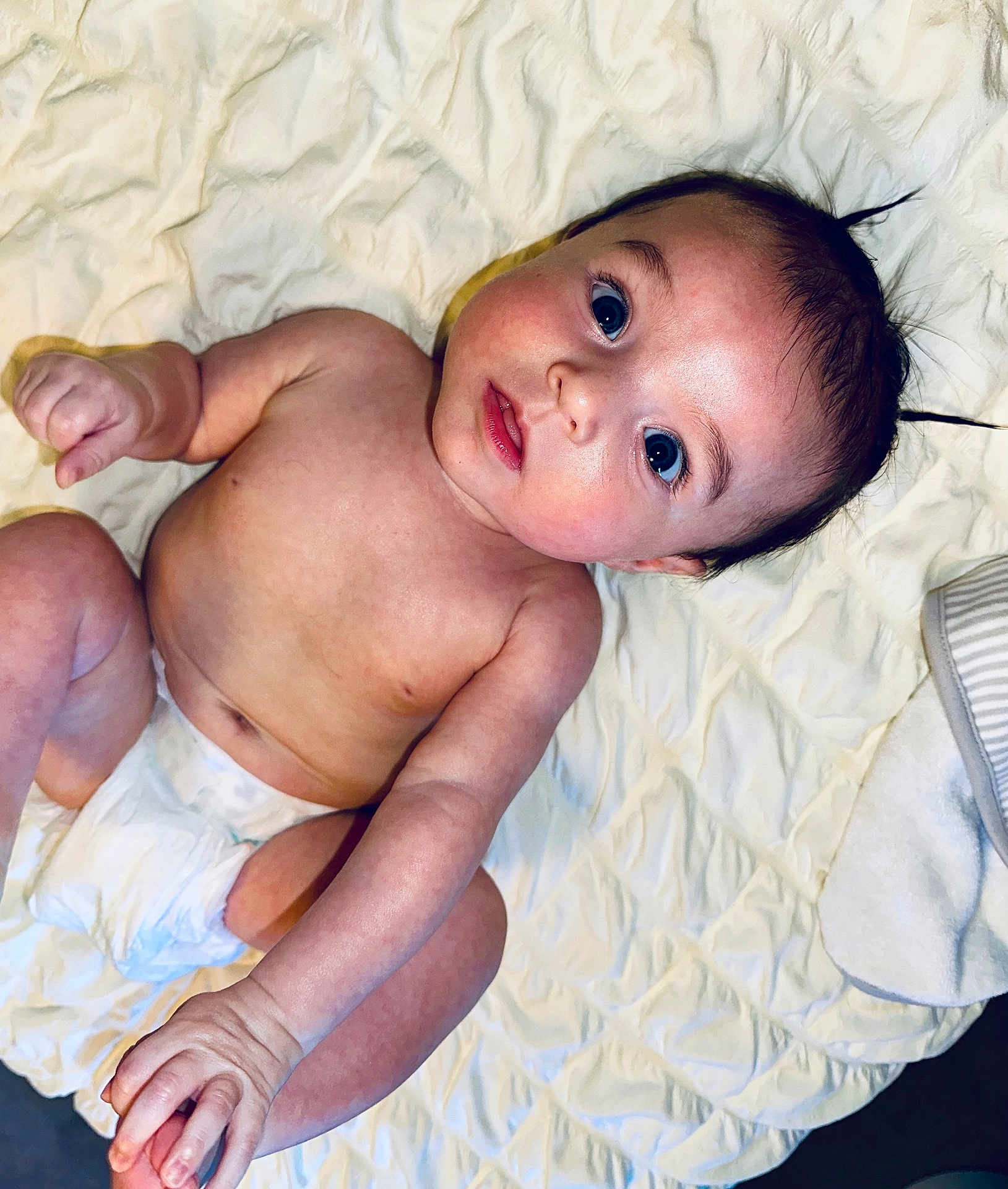 Sakari joined the competition — help win amazing prizes! baby, infant, diaper, skin, face, hand, arm, leg, blue_eyes, hair, blanket, white, cute, child, lying_down, expression, human, newborn, soft, indoors